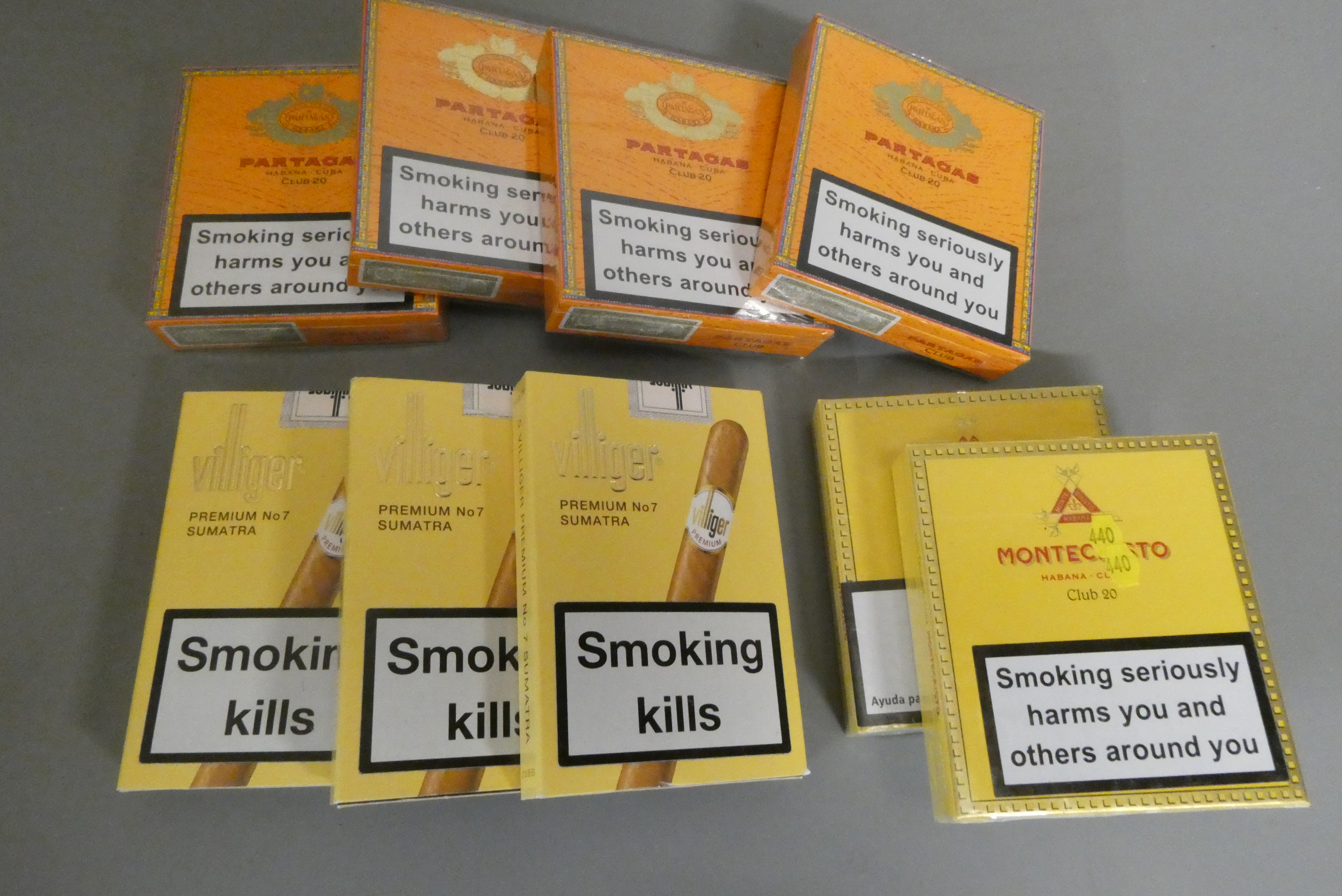 A selection of cigars, comprising four packets of Partagas Club 20 cigars, two packets of Image