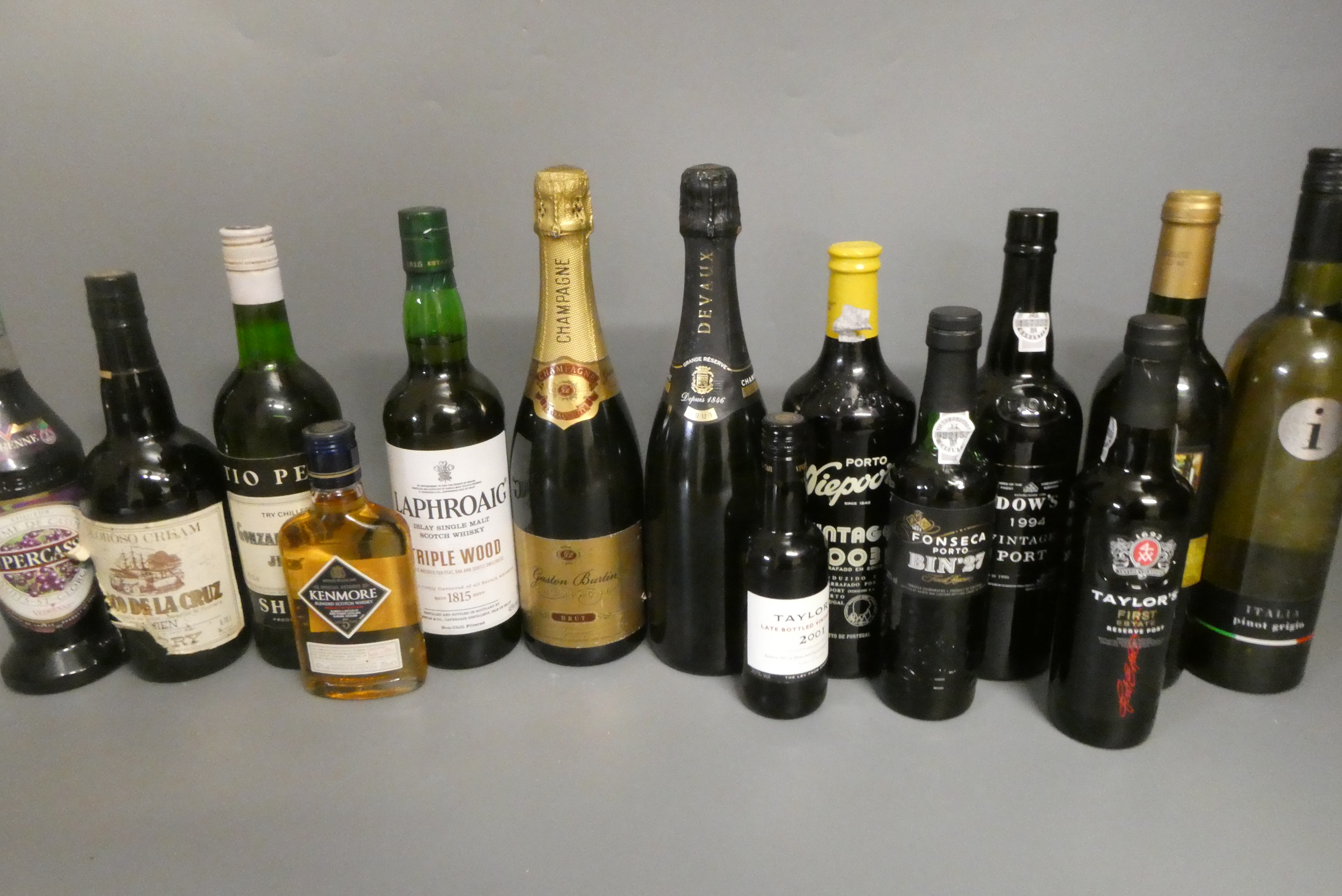 Ten and four half bottles of mixed alcohol Image