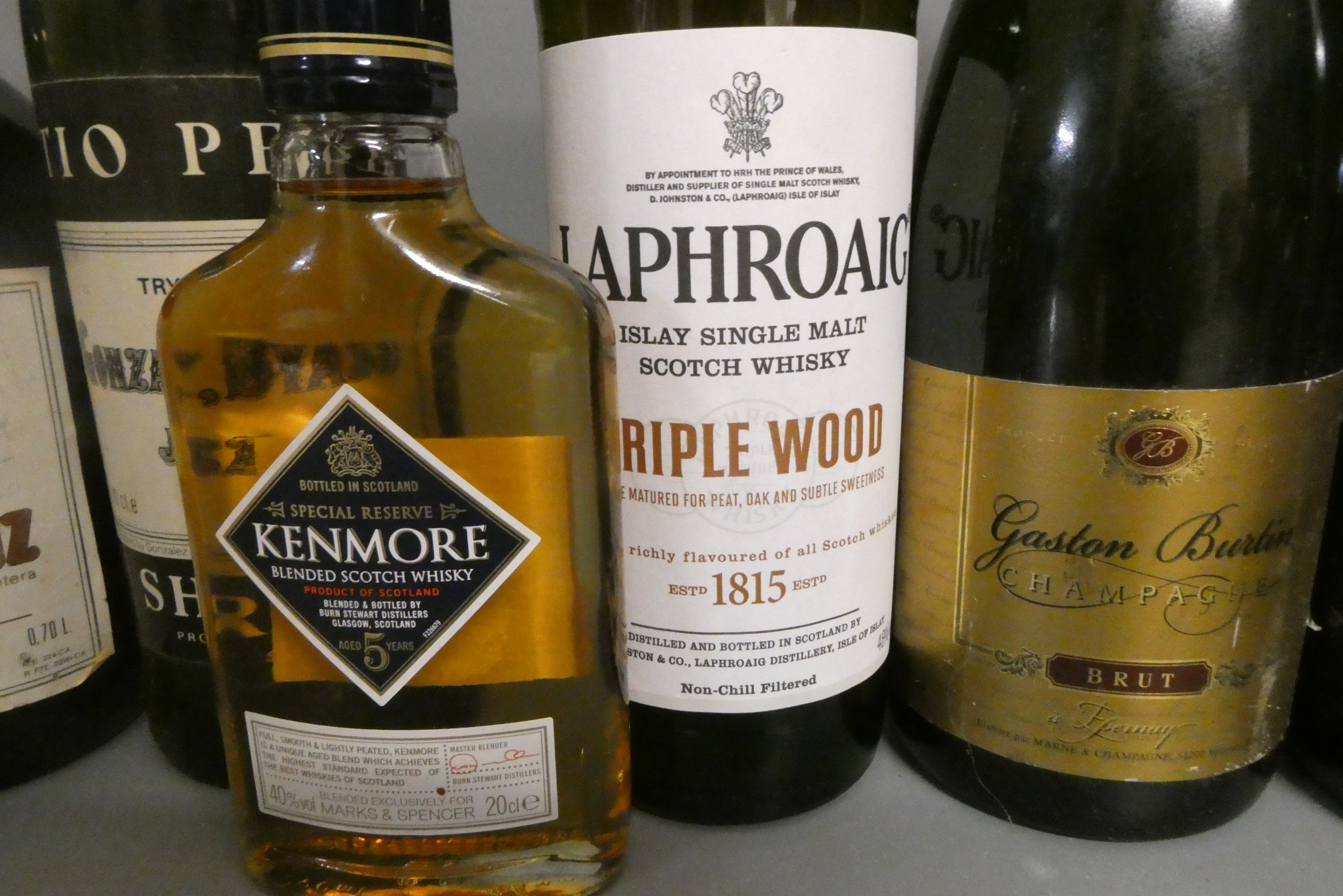 Ten and four half bottles of mixed alcohol Image