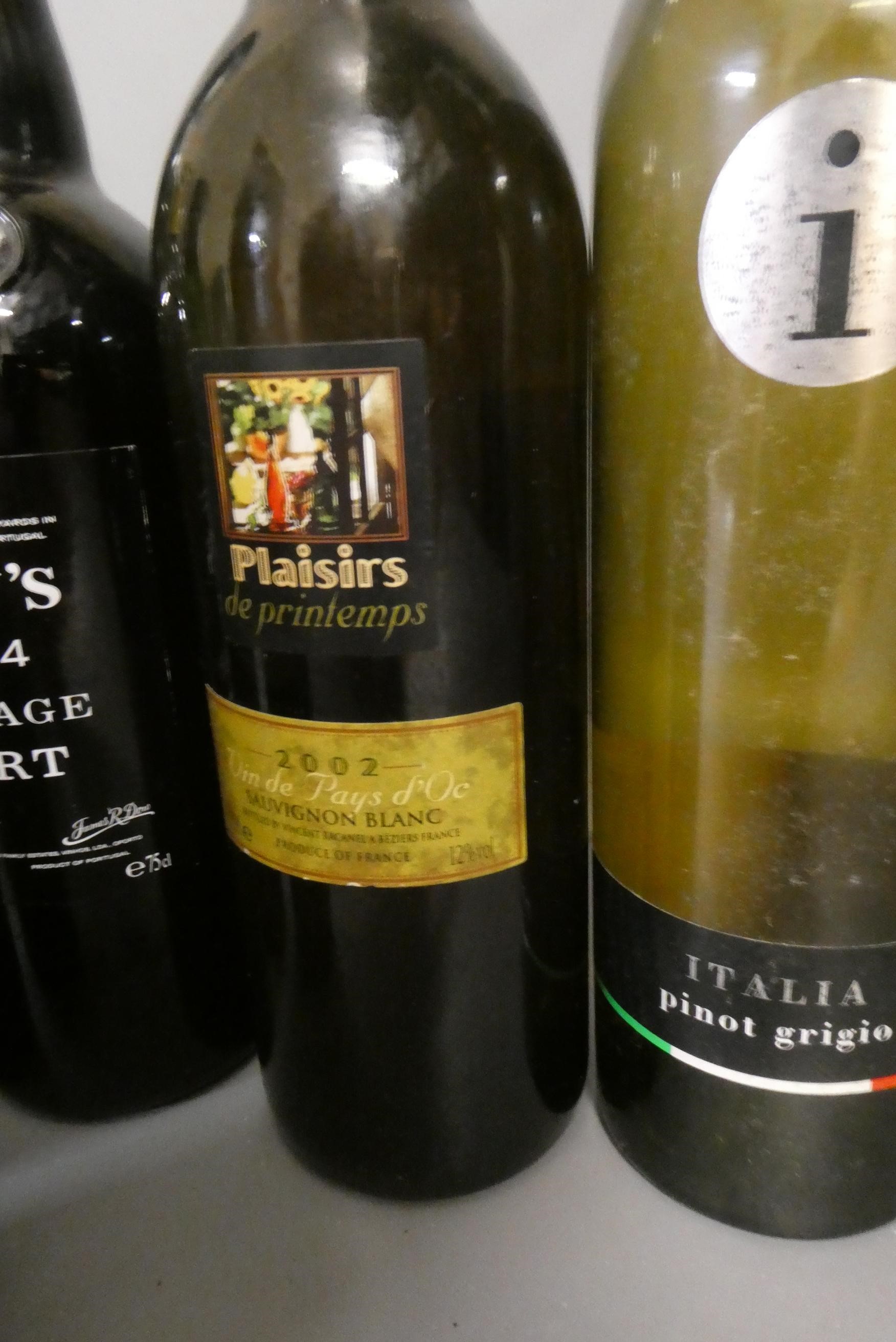 Ten and four half bottles of mixed alcohol Image