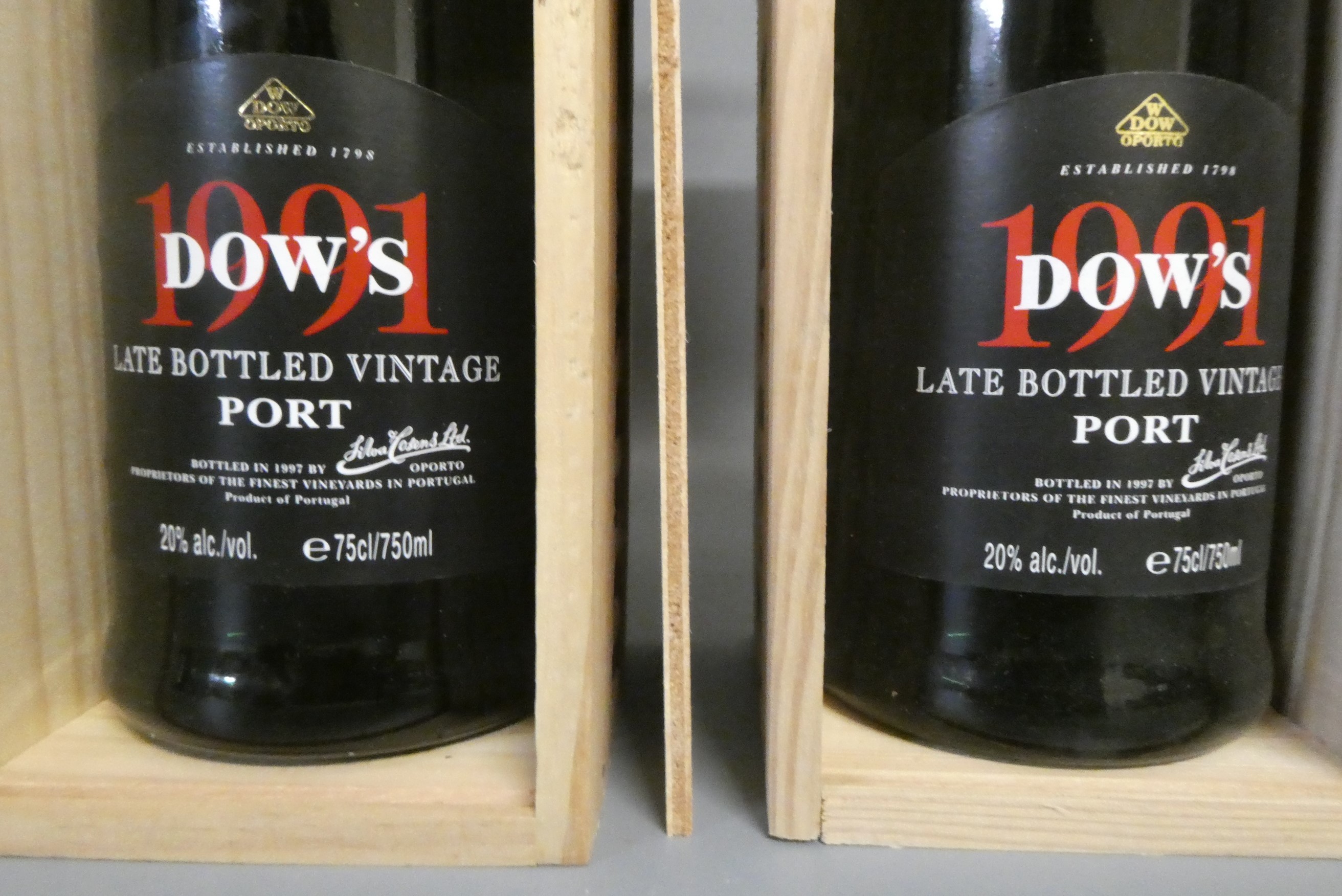 Three bottles of LBV port, comprising a 1974 Warre's and two 1991 Dow's, all boxed (Est. plus 24% Image