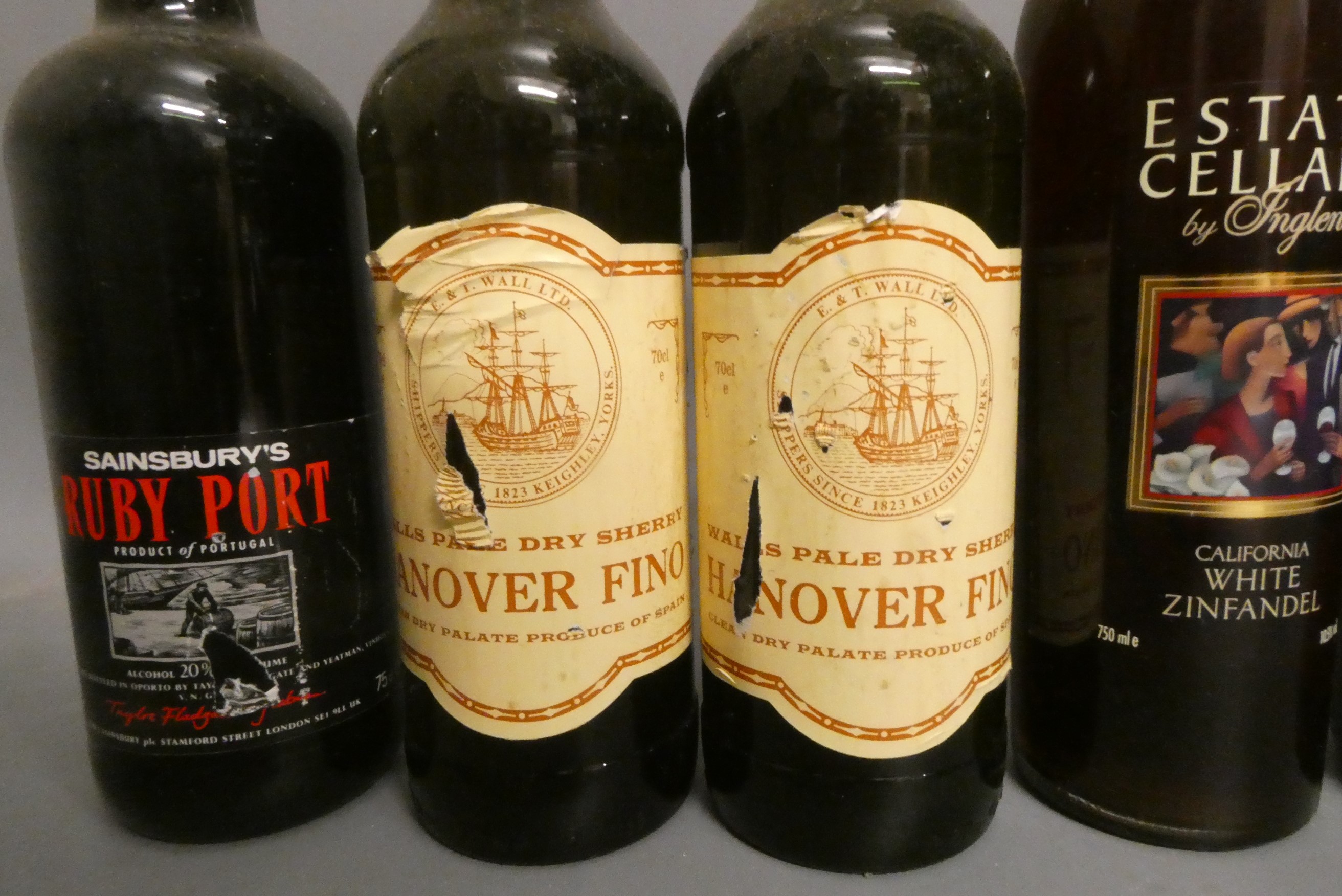 Eight bottles of alcohol Image