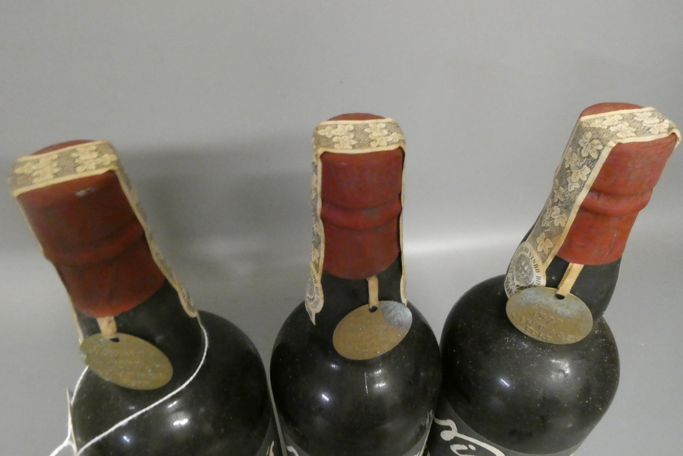 Three bottles Niepoort 1977 vintage port (Est. plus 24% premium inc. VAT) Image
