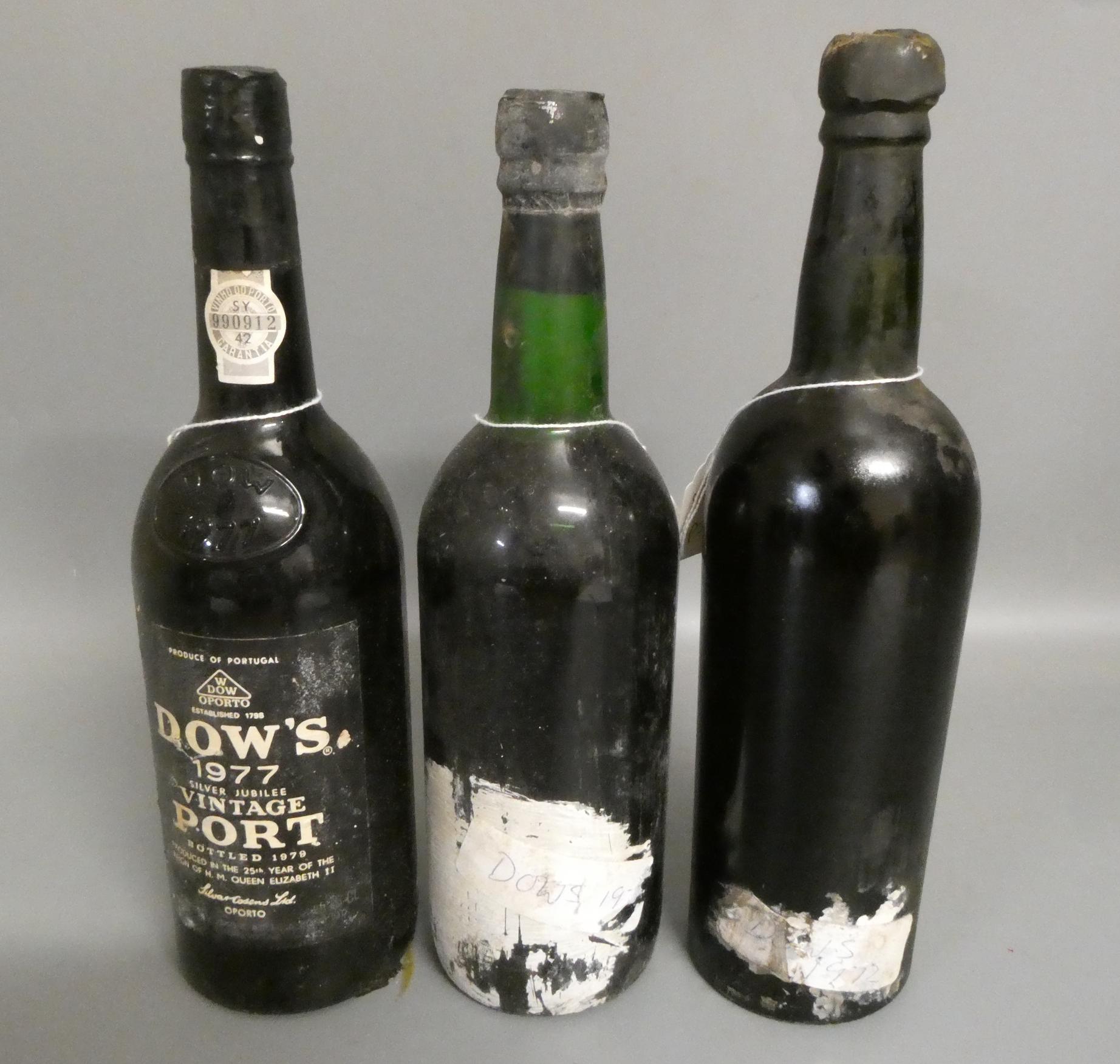 Three bottles Dow's vintage port, comprising one 1970, one 1977 and another that is purporting to be Image