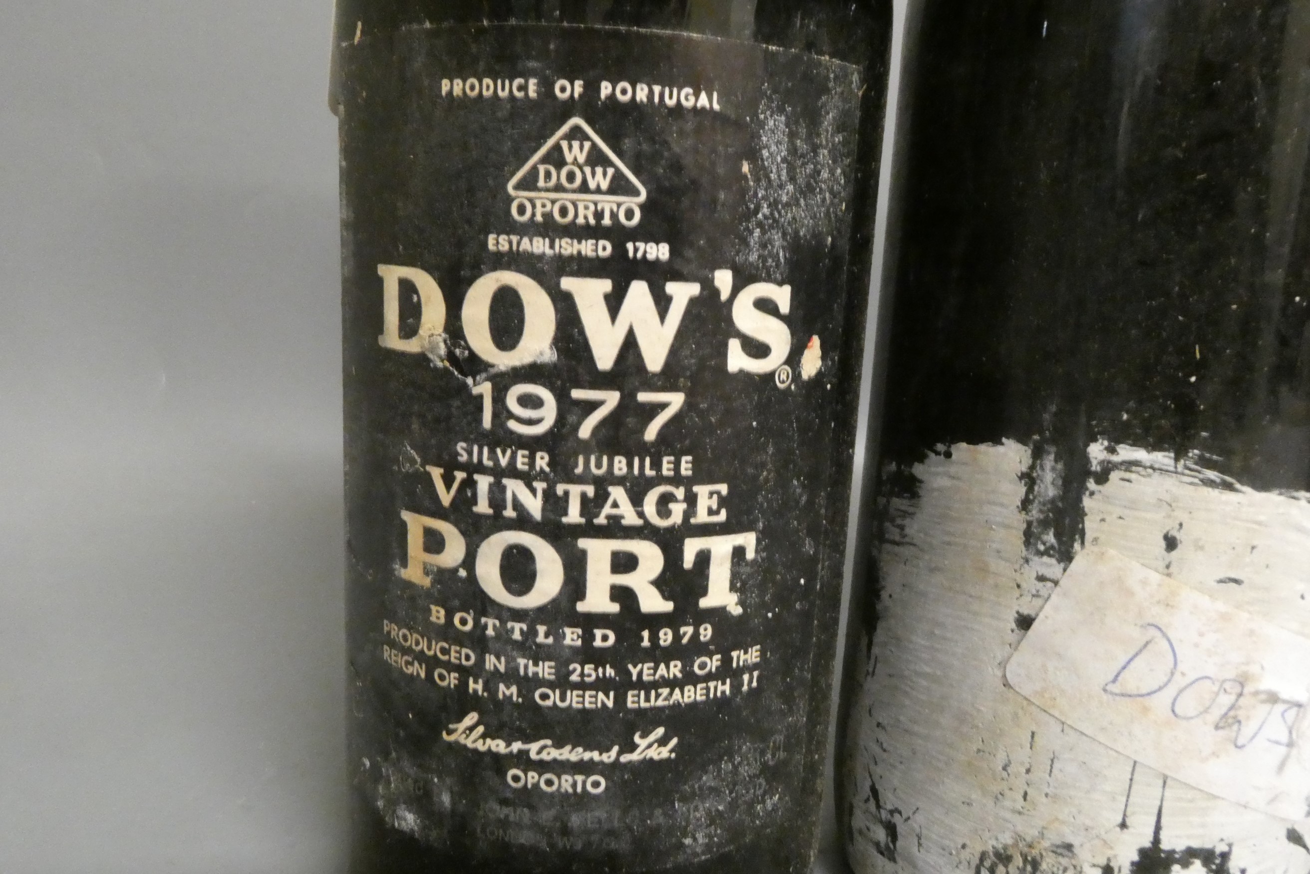 Three bottles Dow's vintage port, comprising one 1970, one 1977 and another that is purporting to be Image