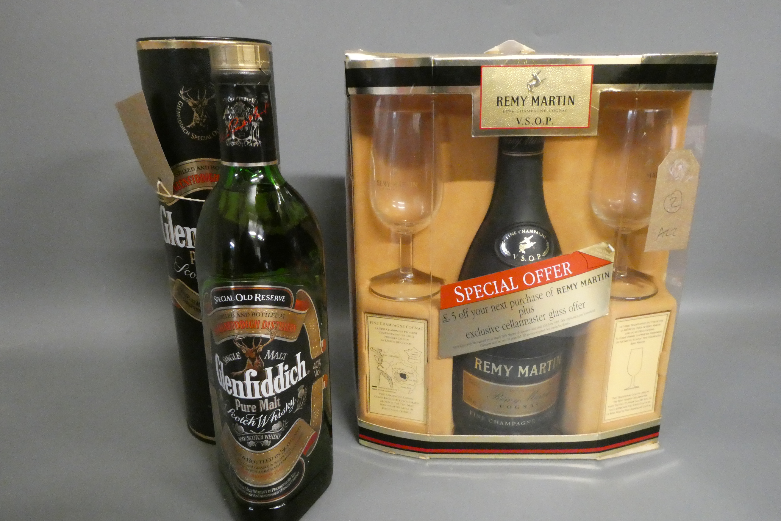 One bottle Glenfiddich pure malt scotch whisky, in tube, together with a boxed Remy Martin VSOP fine Image