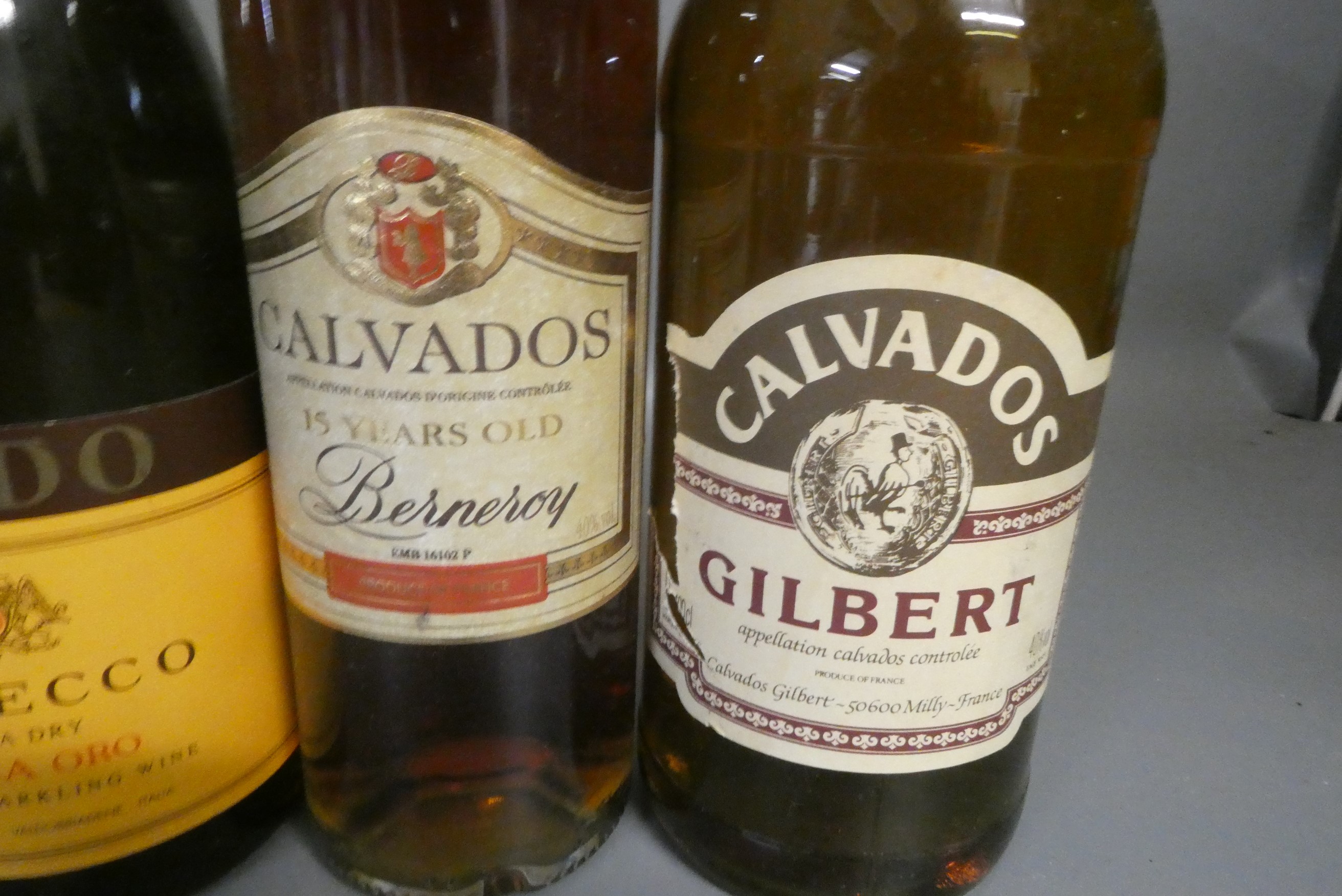 Seven bottles of mixed alcohol Image