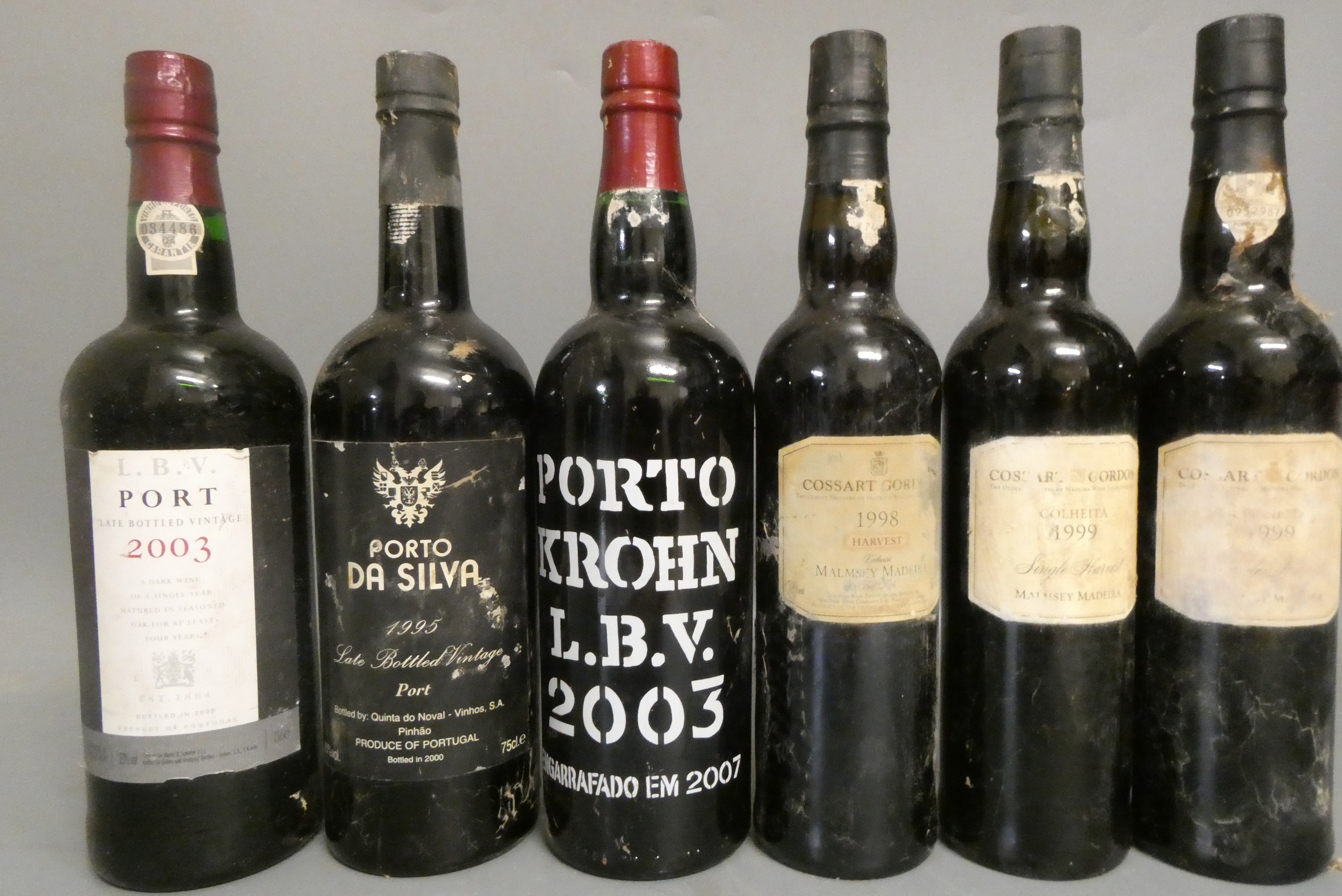 Six mixed bottles of port & madeira Image