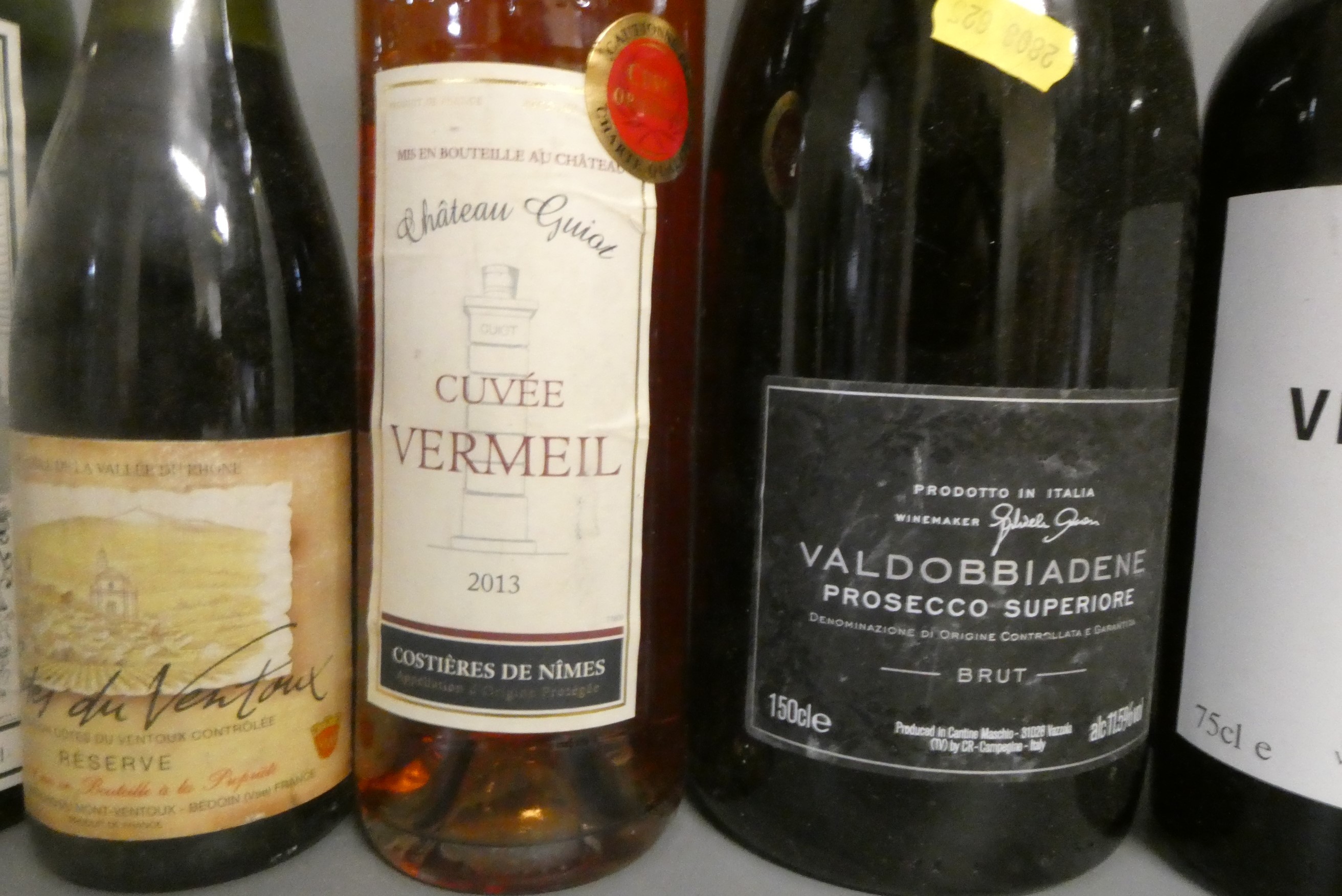 Nine bottles of port and other alcohol Image