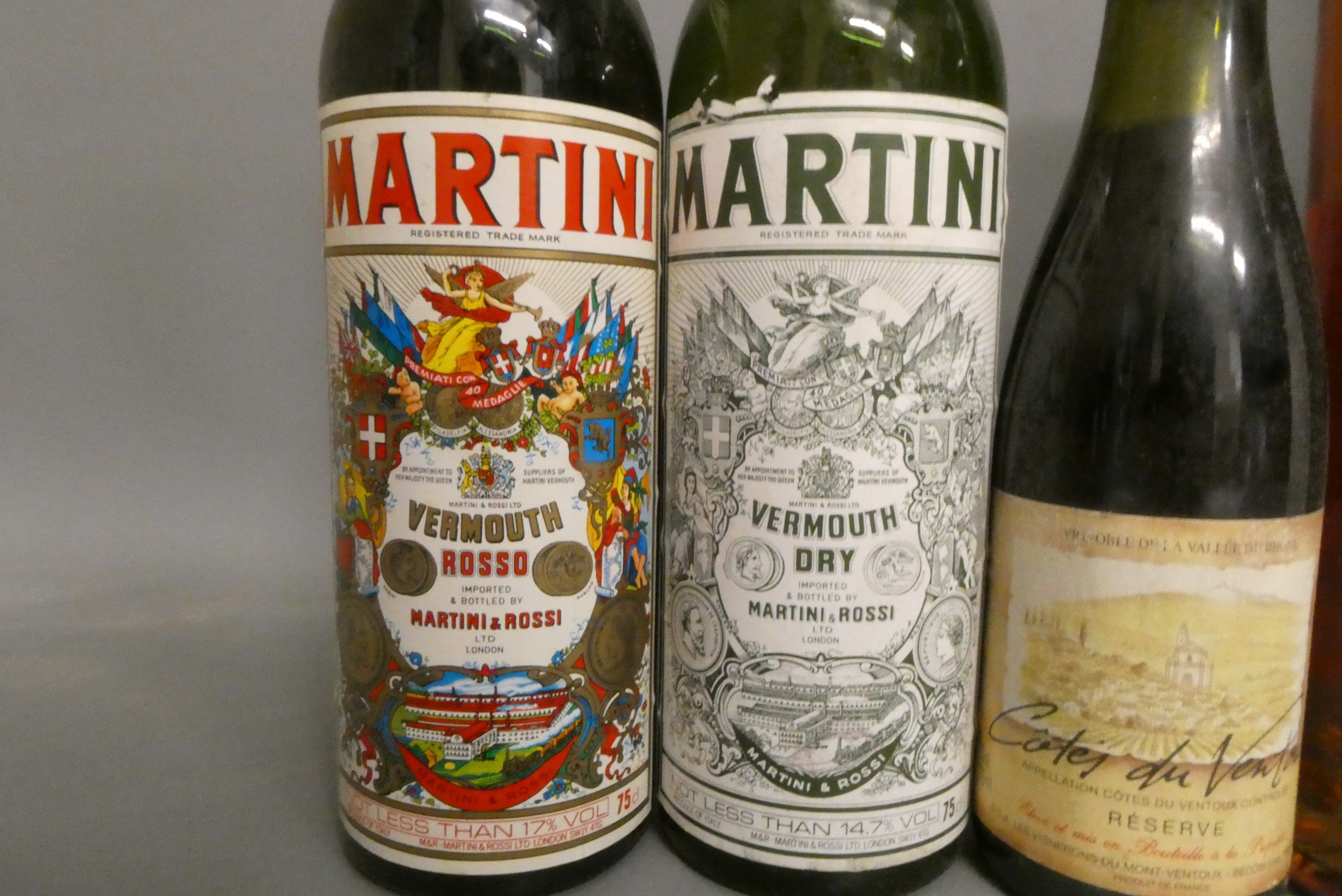 Nine bottles of port and other alcohol Image