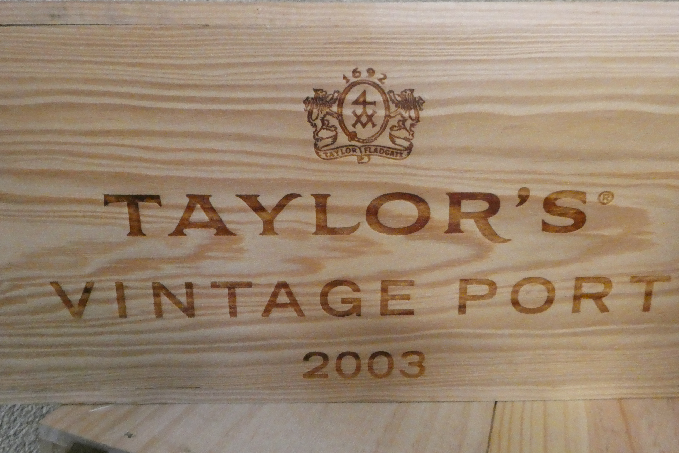 Six bottles Taylor's 2003 vintage port, OWC (Est. plus 24% premium inc. VAT) Image