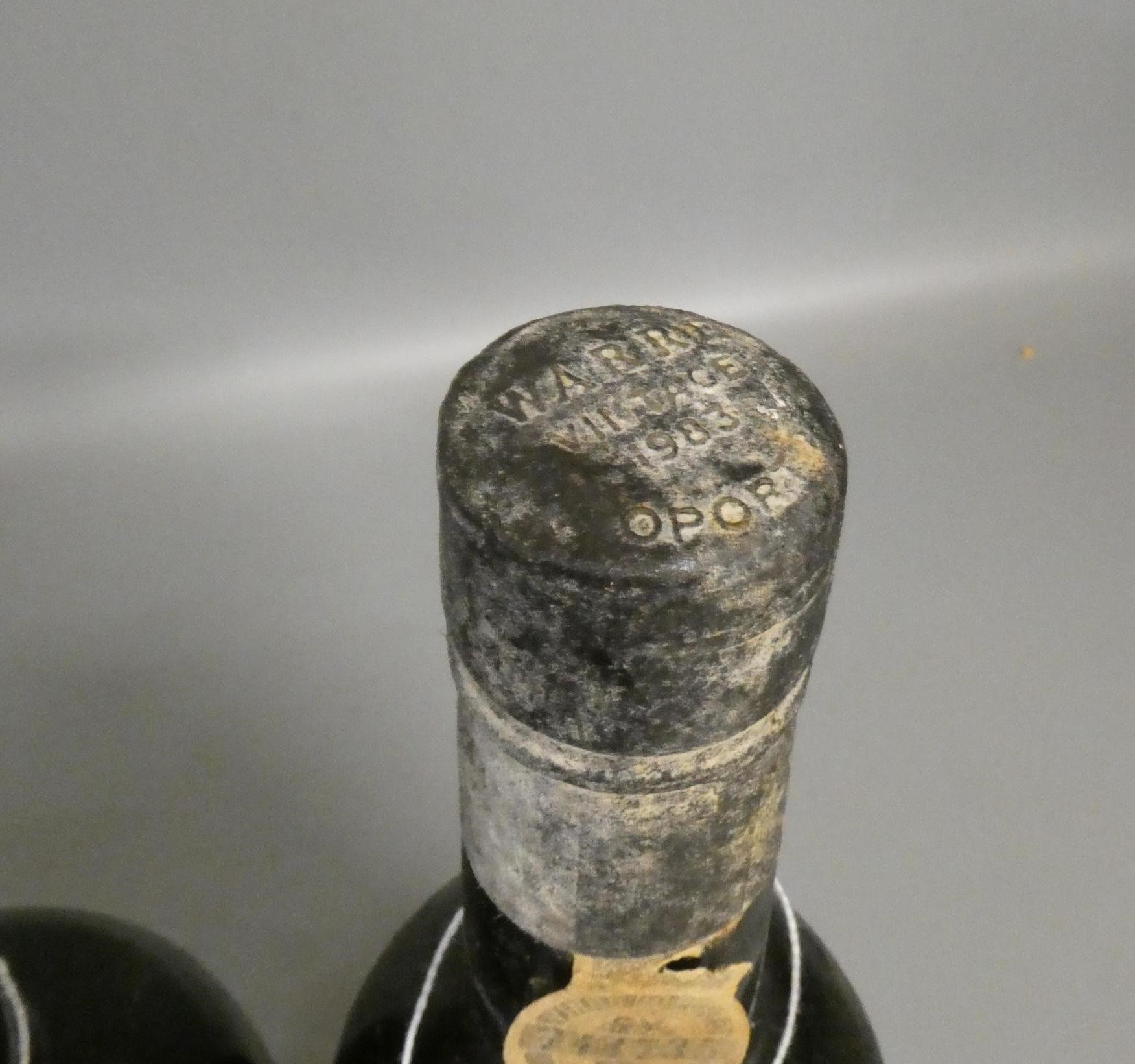 One bottle Warre's 1983 vintage port, together with one bottle Real Companhia Velha 1985 vintage Image