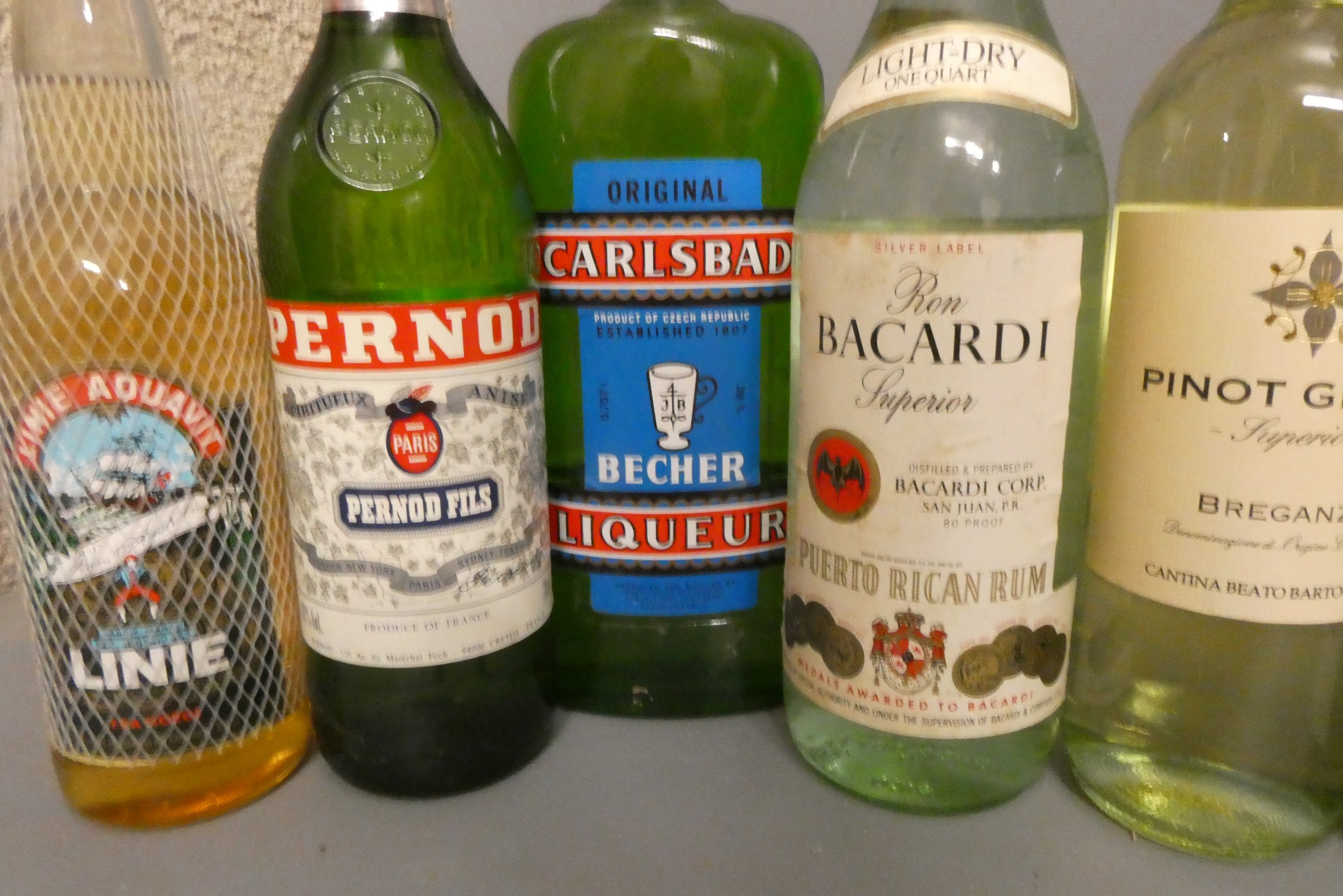 Fourteen bottles of mixed wine and liqueur Image