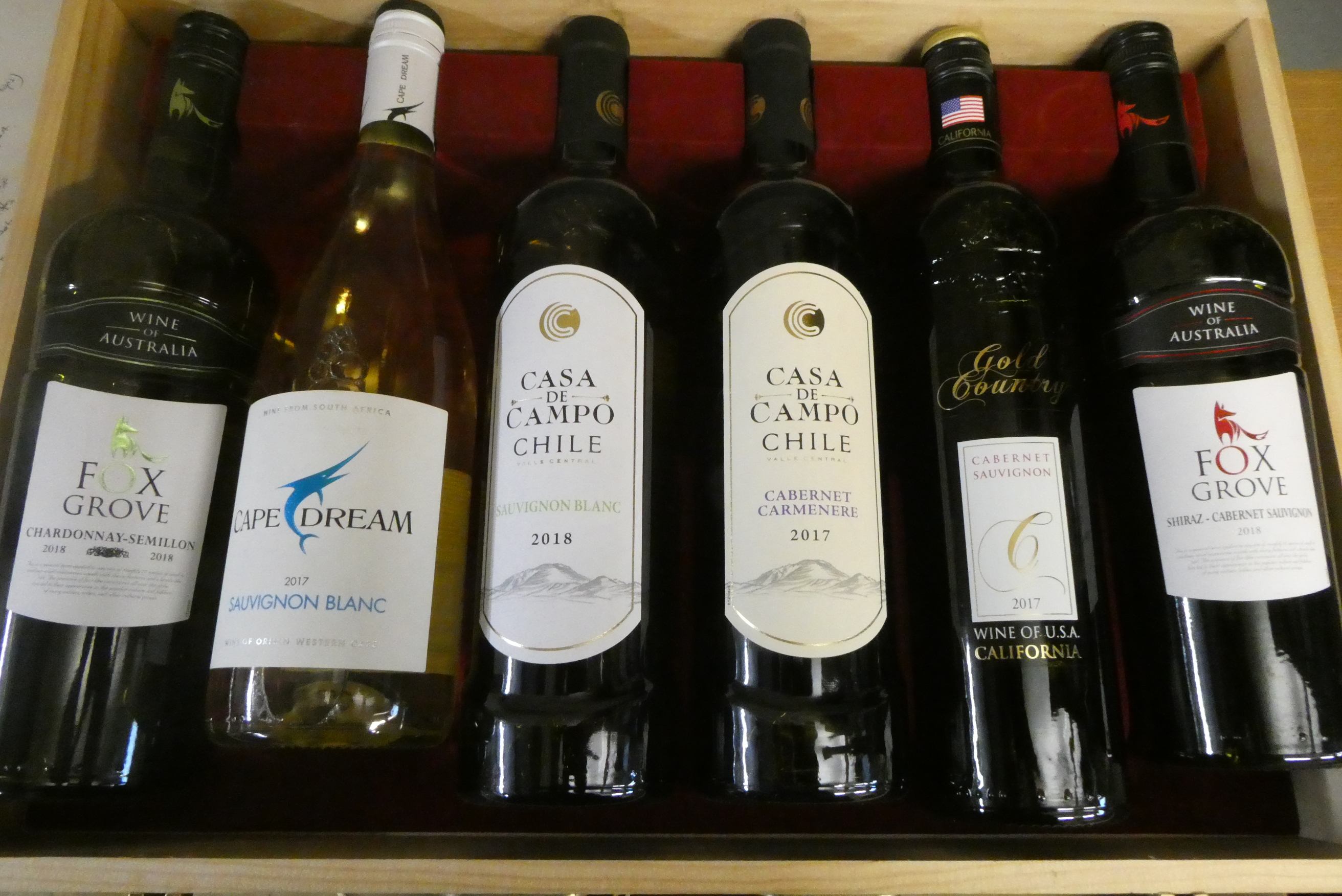 Six bottles of New World wine Image