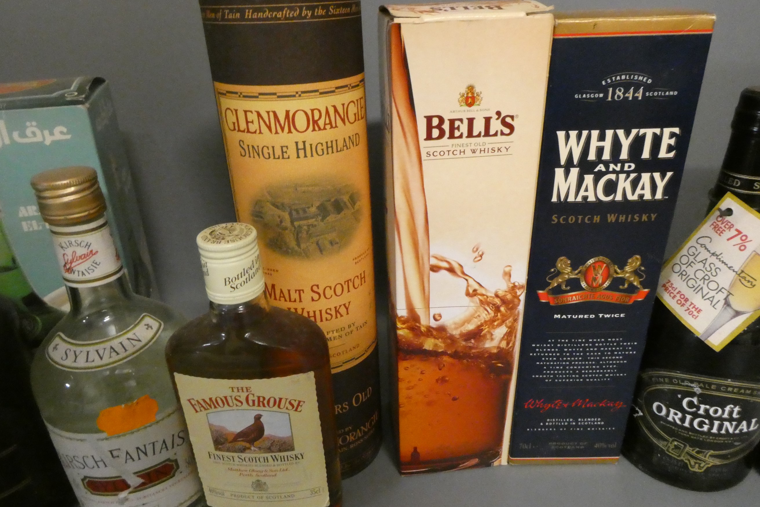 Fourteen mixed bottles of whisky Image