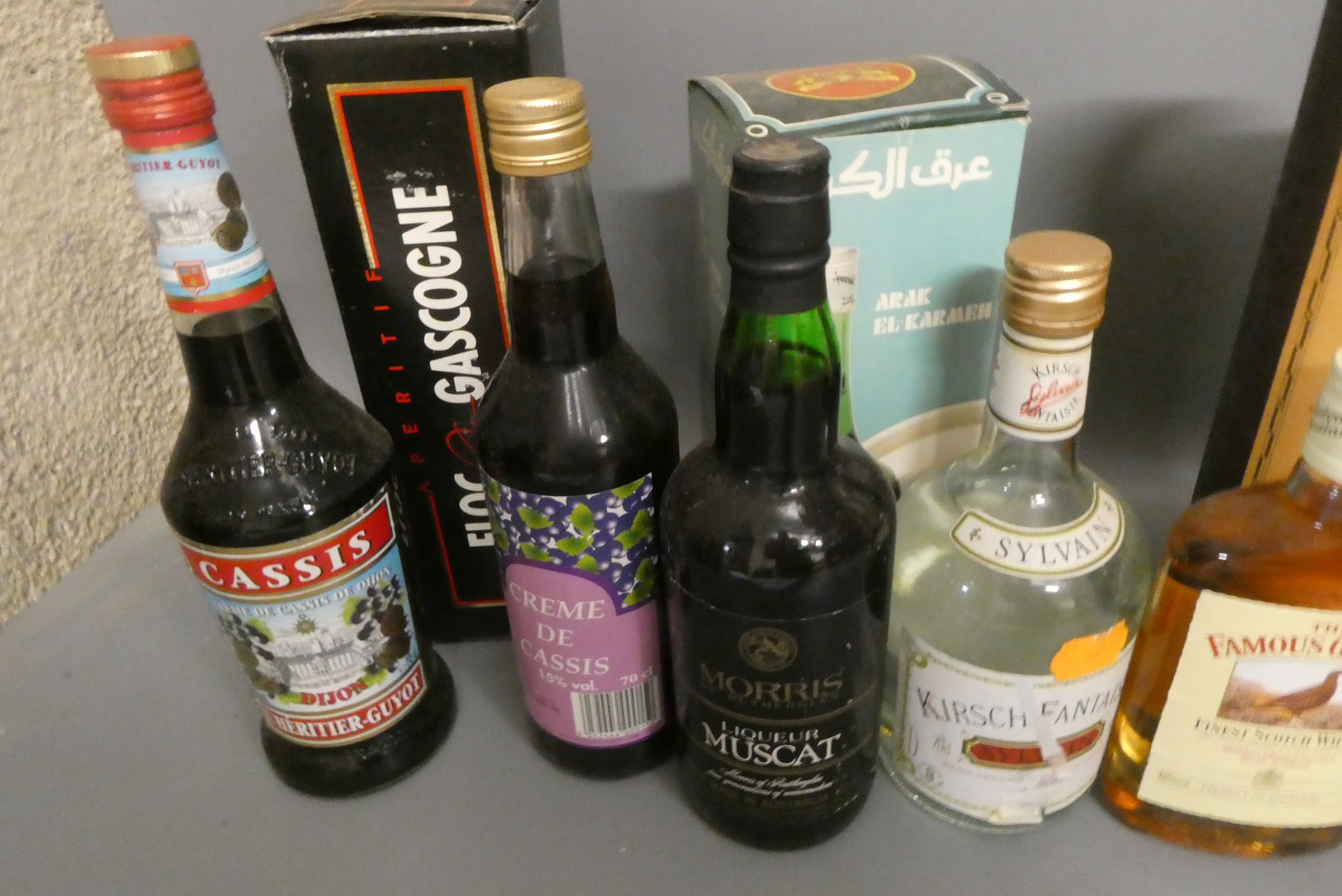 Fourteen mixed bottles of whisky Image