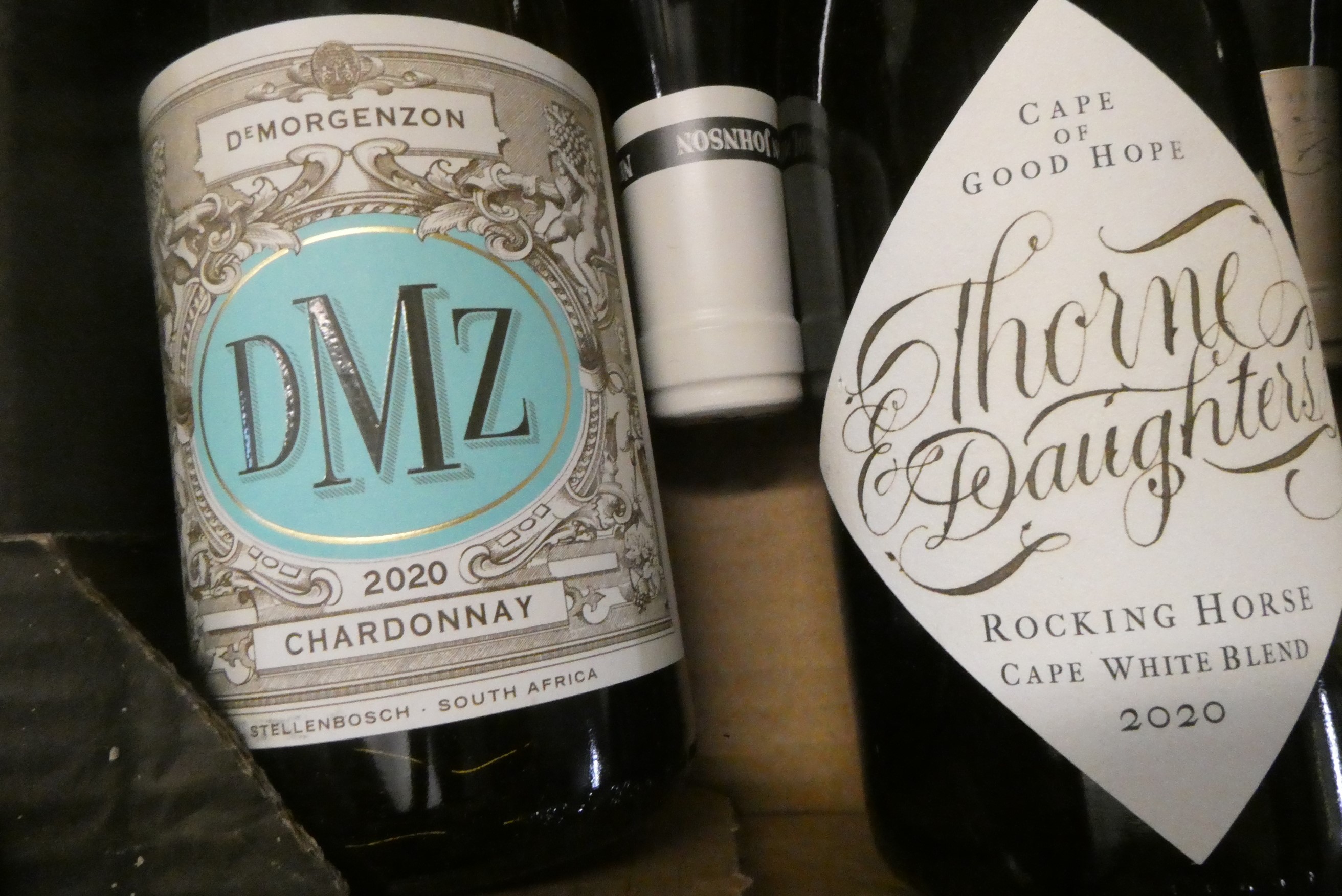 Ten bottles of South African white wine Image