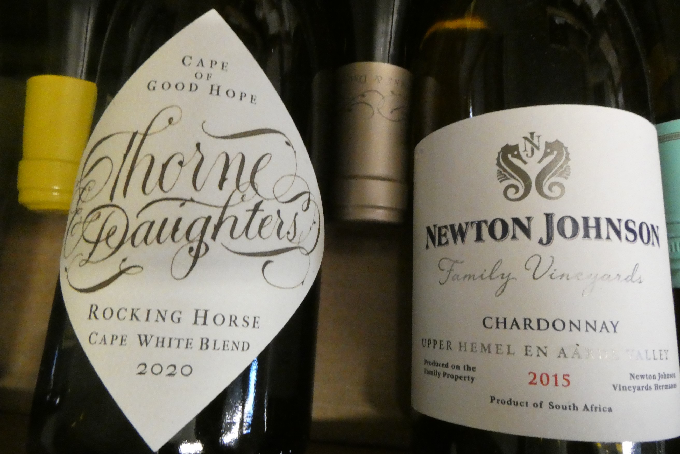 Ten bottles of South African white wine Image