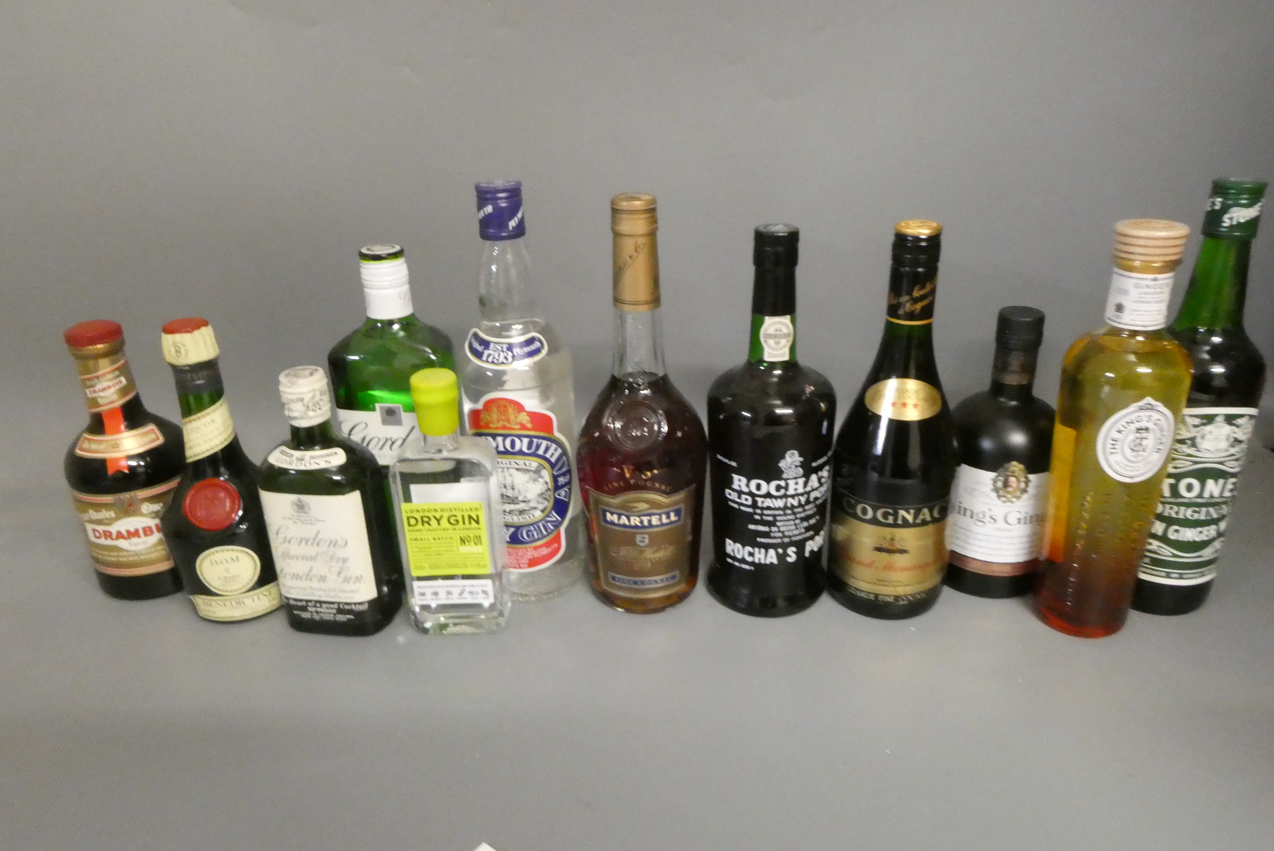 Twelve bottles of mixed liqueur and spirits Image