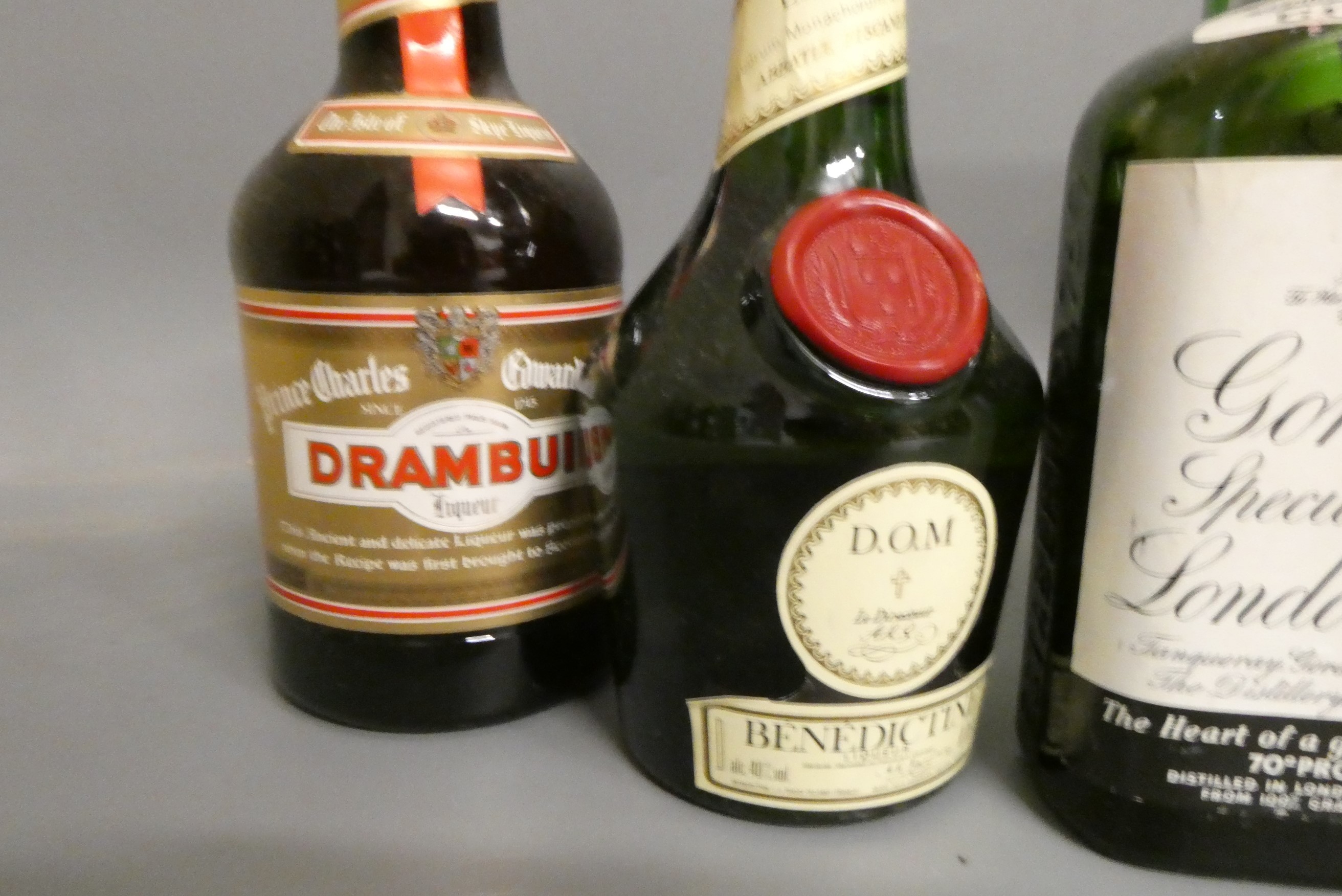 Twelve bottles of mixed liqueur and spirits Image