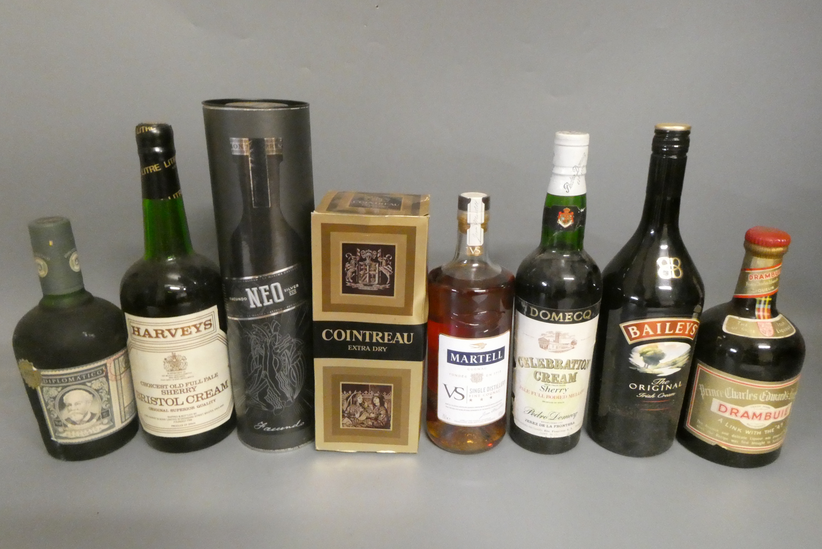 Eight bottles of mixed liqueurs and spirits Image