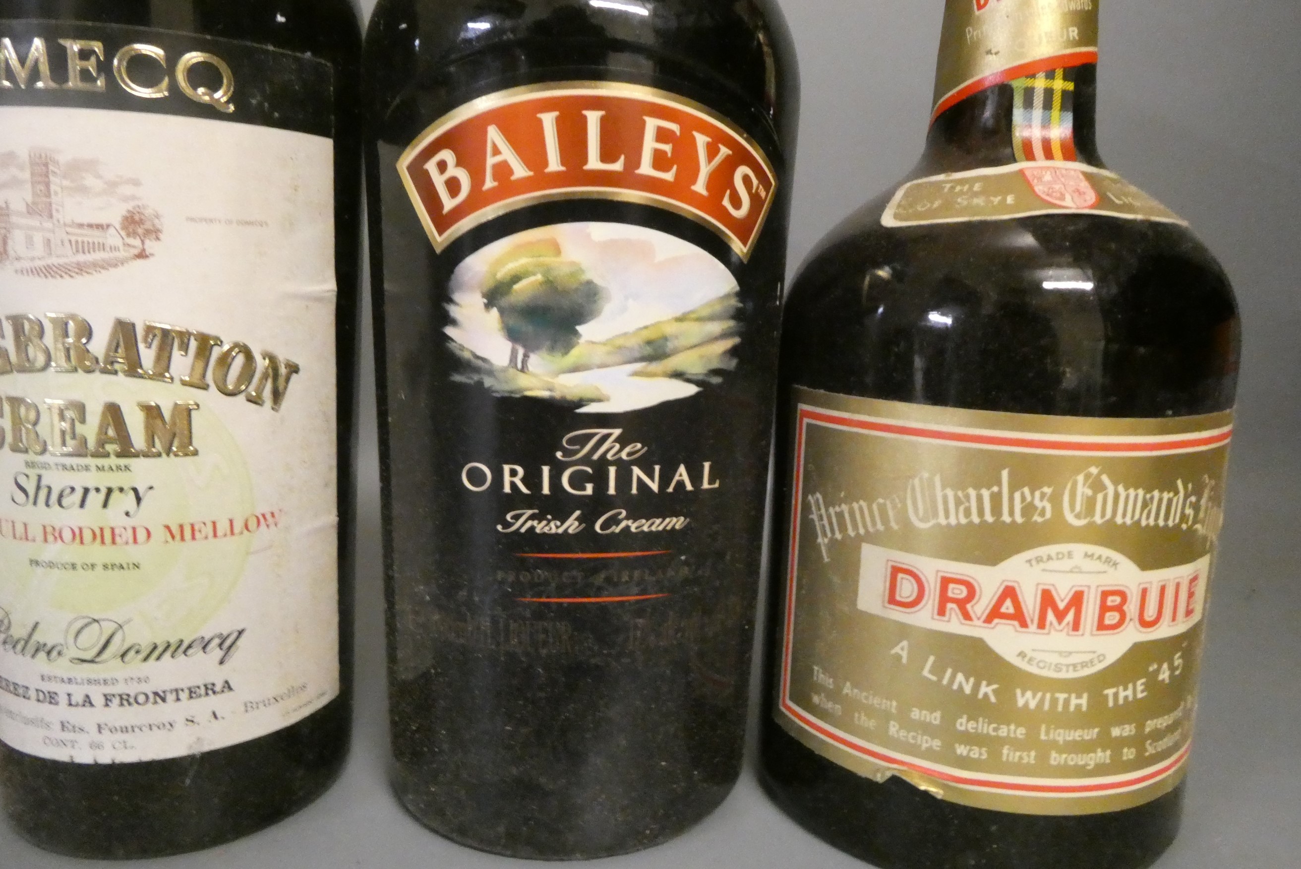 Eight bottles of mixed liqueurs and spirits Image