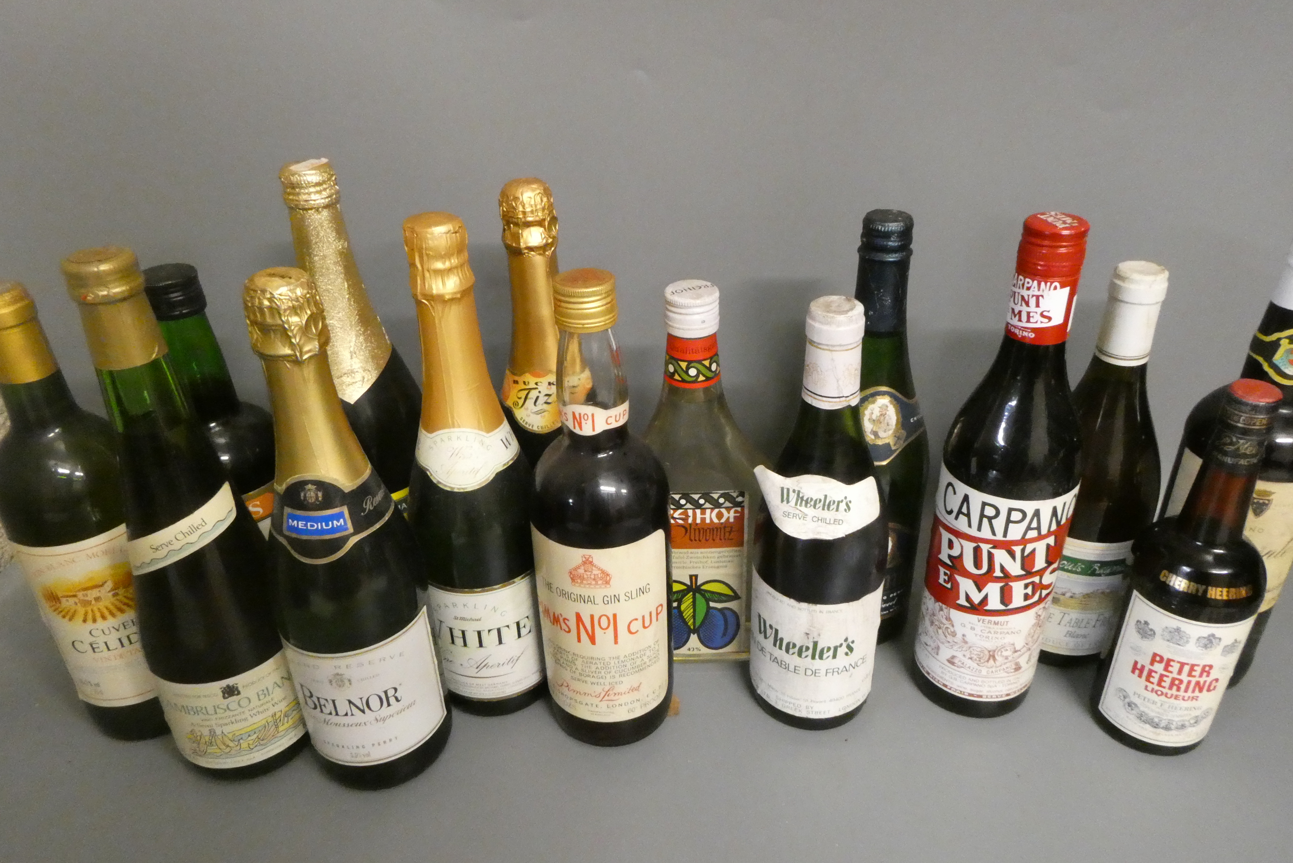 Twenty seven bottles of mixed alcohol Image