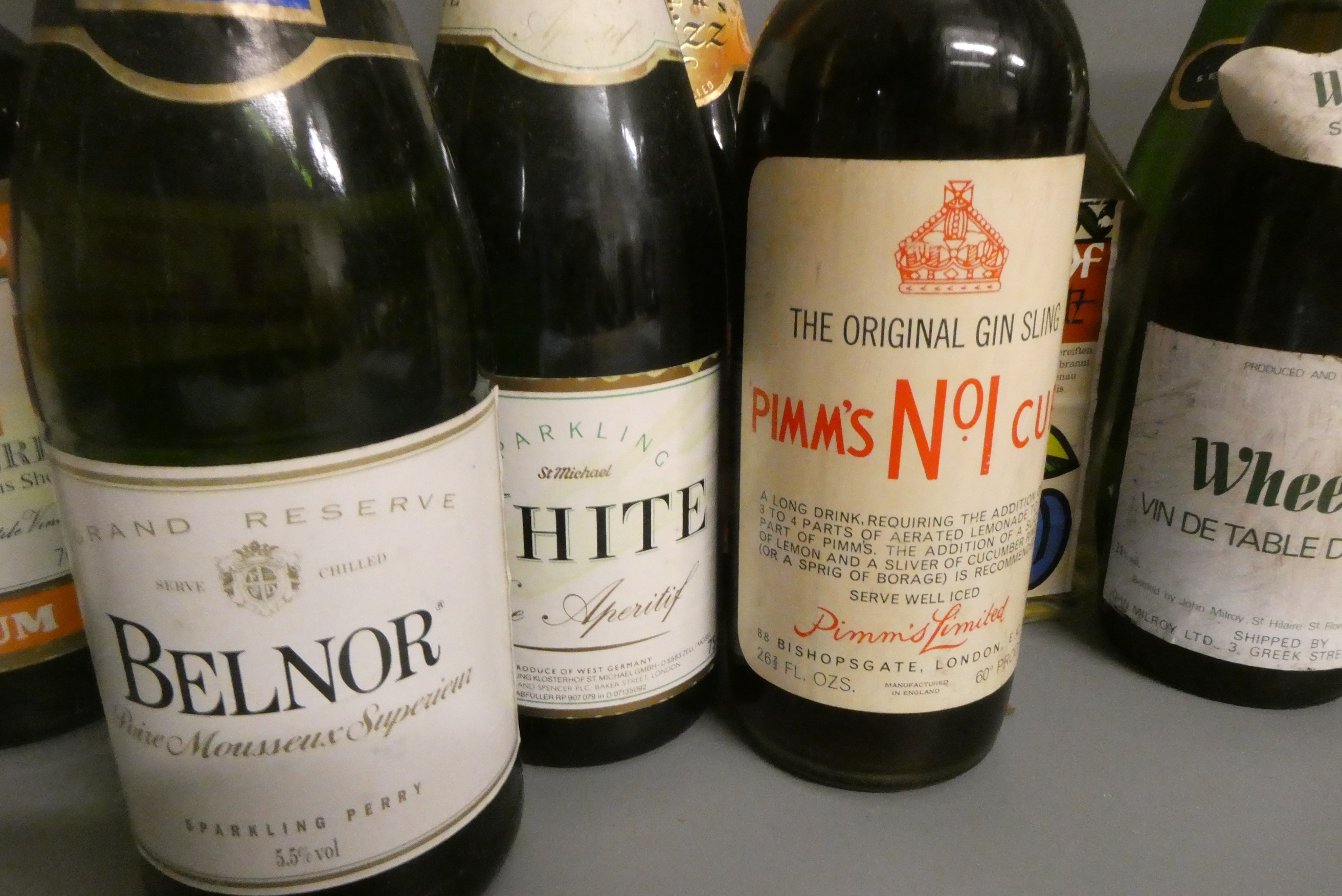 Twenty seven bottles of mixed alcohol Image