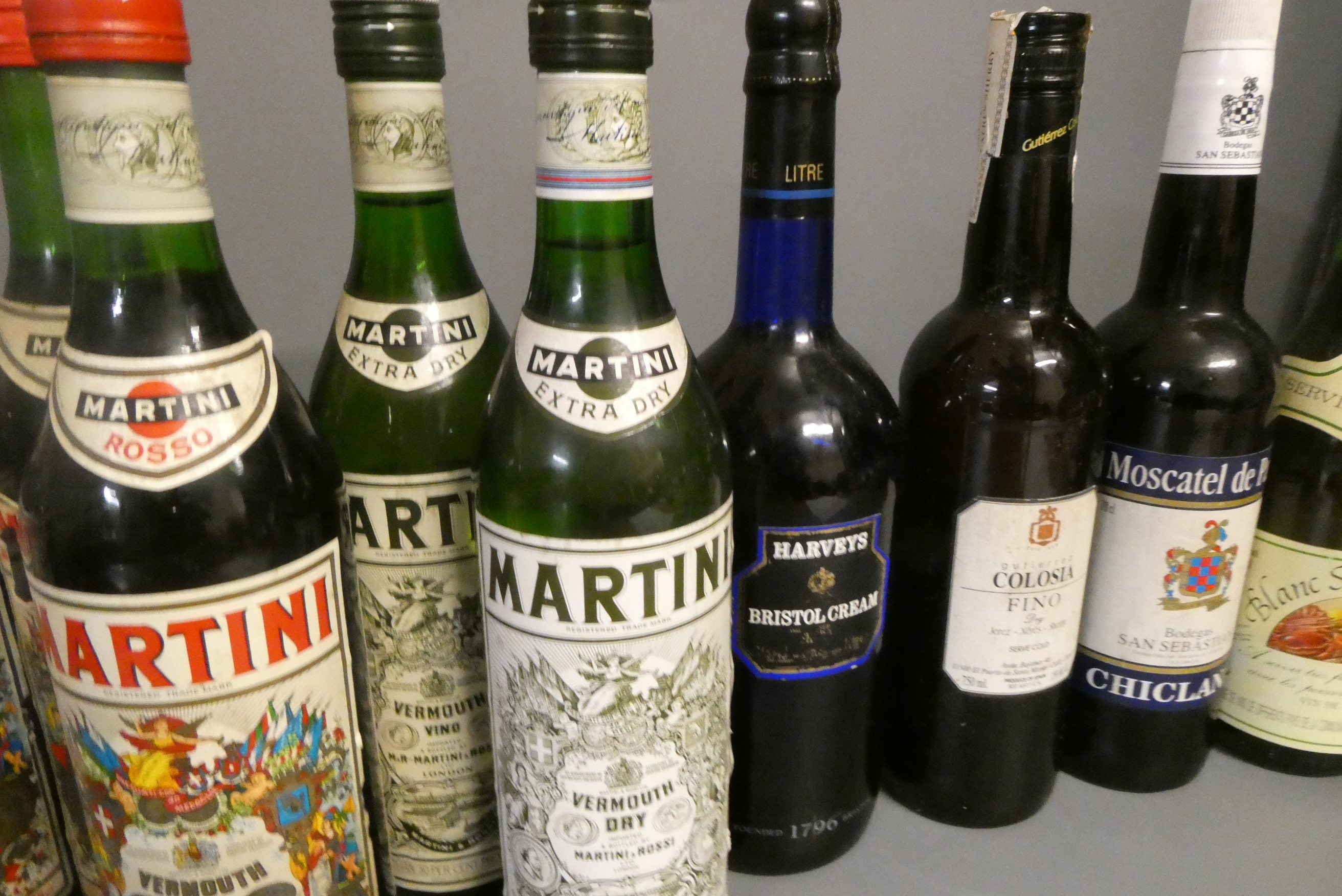 Twenty seven bottles of mixed alcohol Image