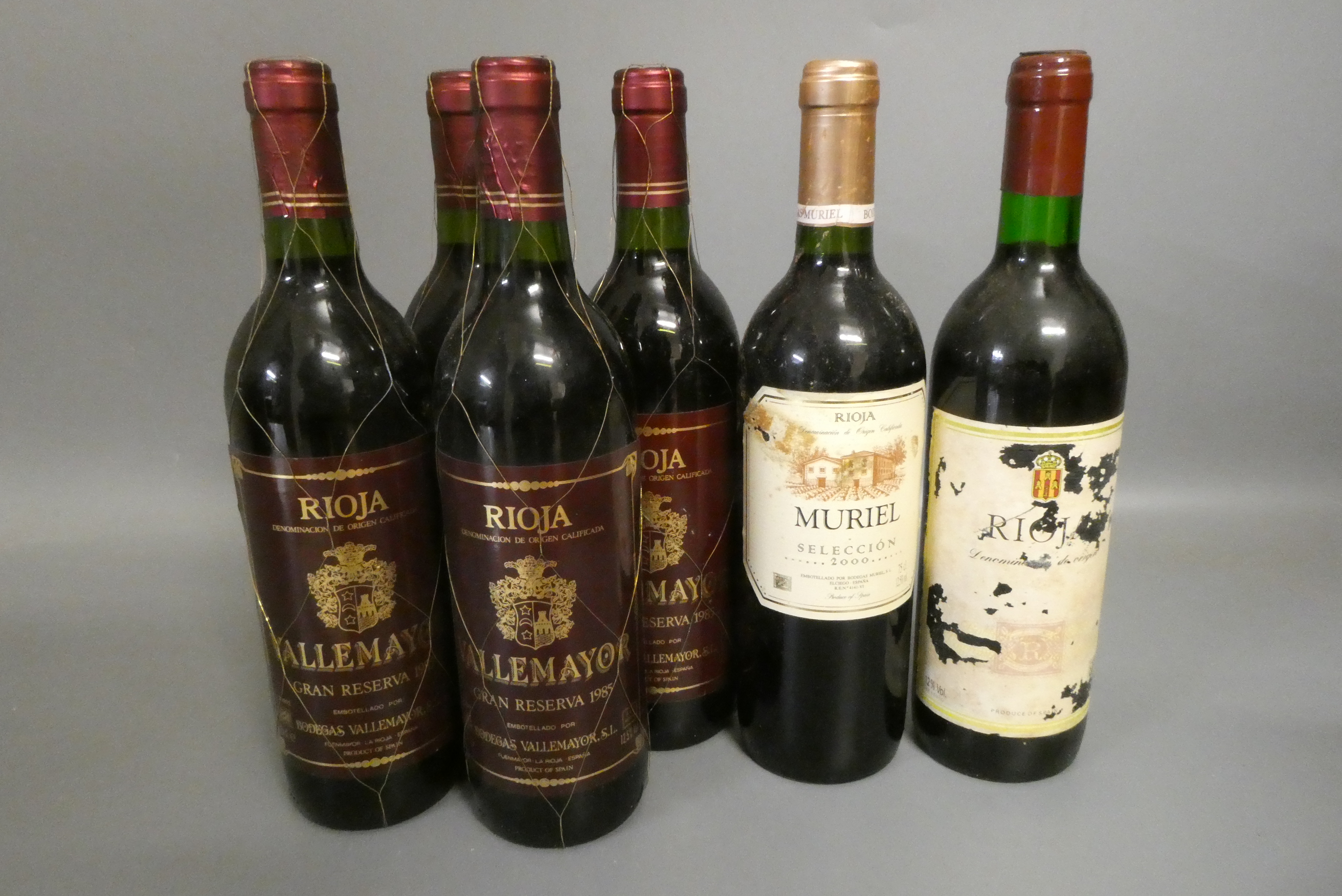 Six bottles of rioja, comprising four 1985 Vallemayor, a 2000 Muriel and another (Est. plus 24% Image