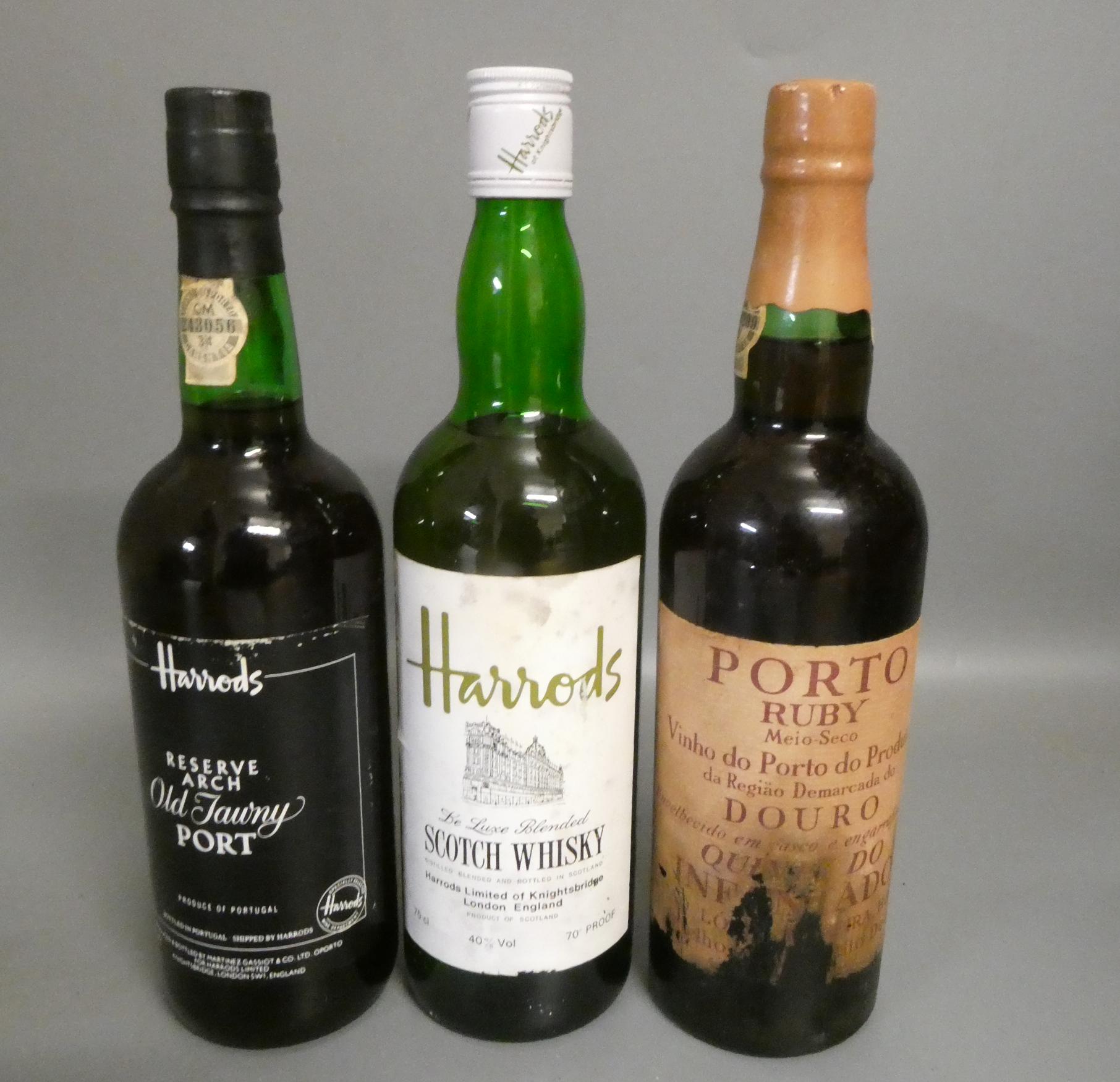 One bottle of Harrods de luxe blended scotch whisky, together with a Harrods old tawny port and a Image