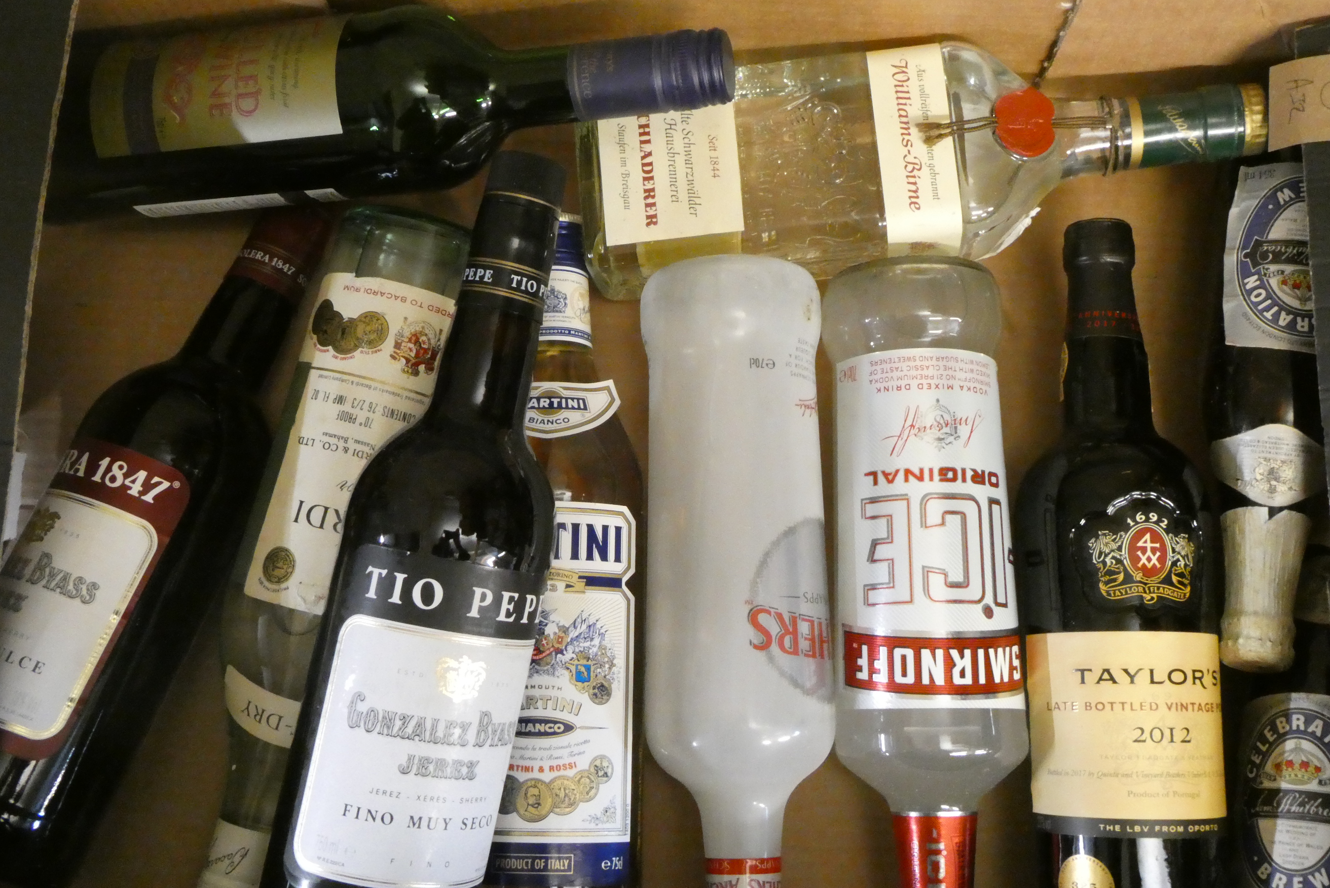 Eleven bottles of mixed alcohol Image