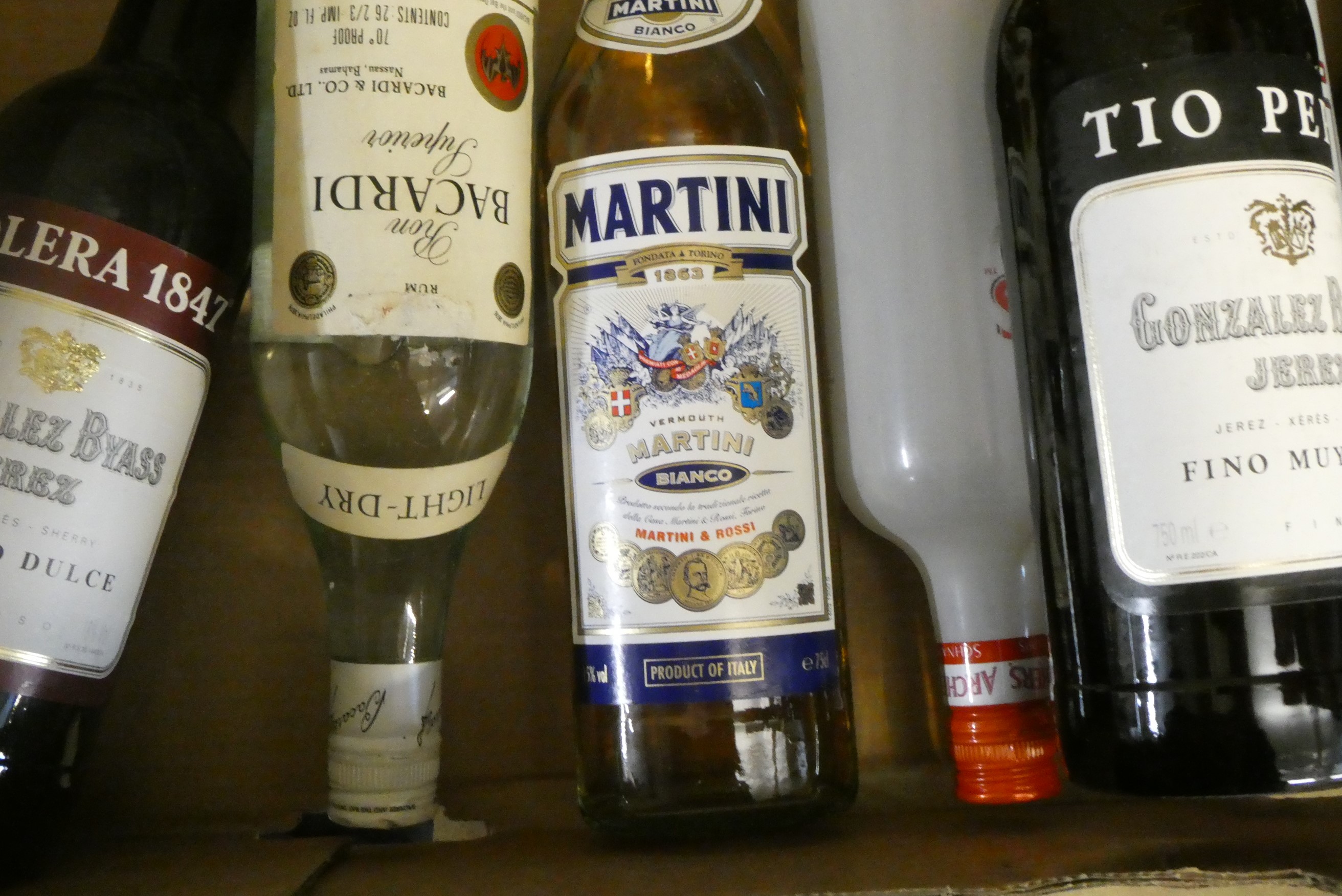 Eleven bottles of mixed alcohol Image