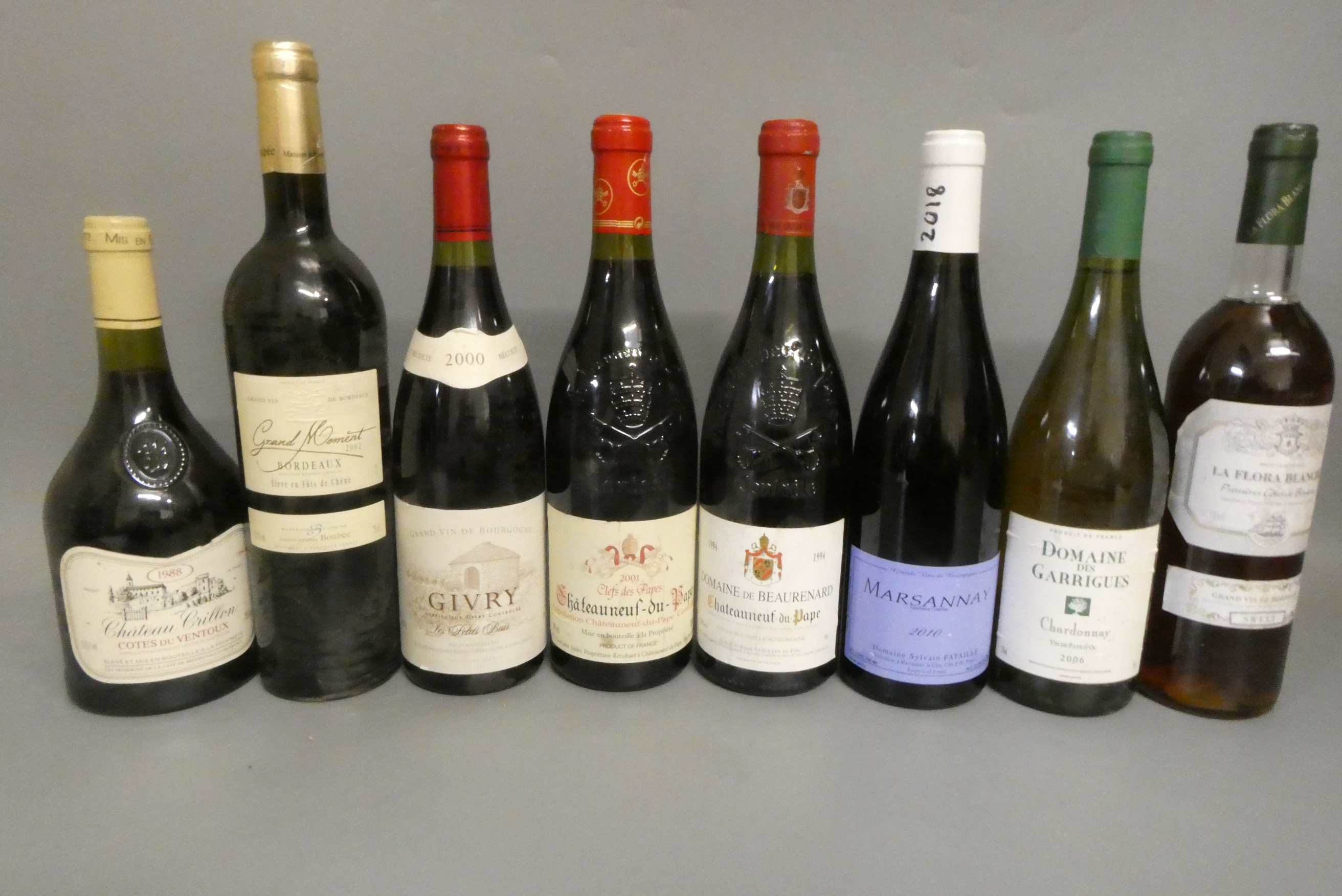 Eight bottles of French wine Image