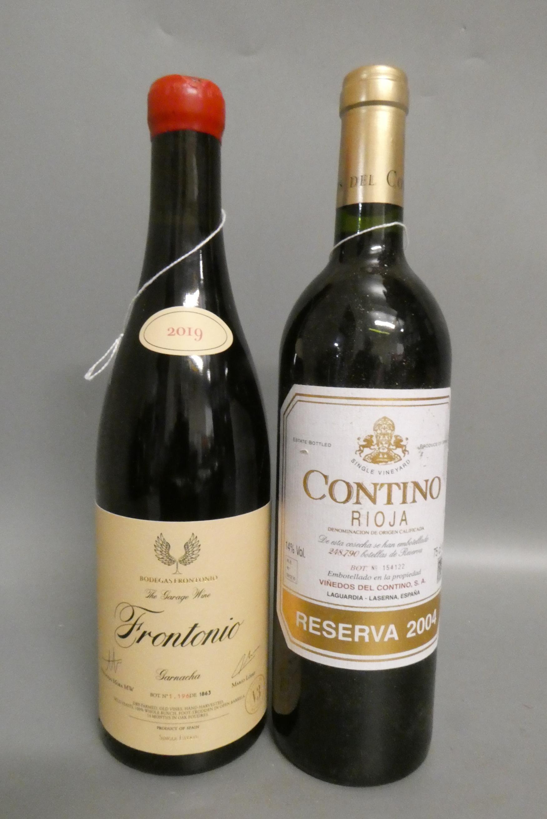 Two bottles of Spanish wine, comprising one 2004 Contino rioja, vinedos del contino, and a 2019 Image