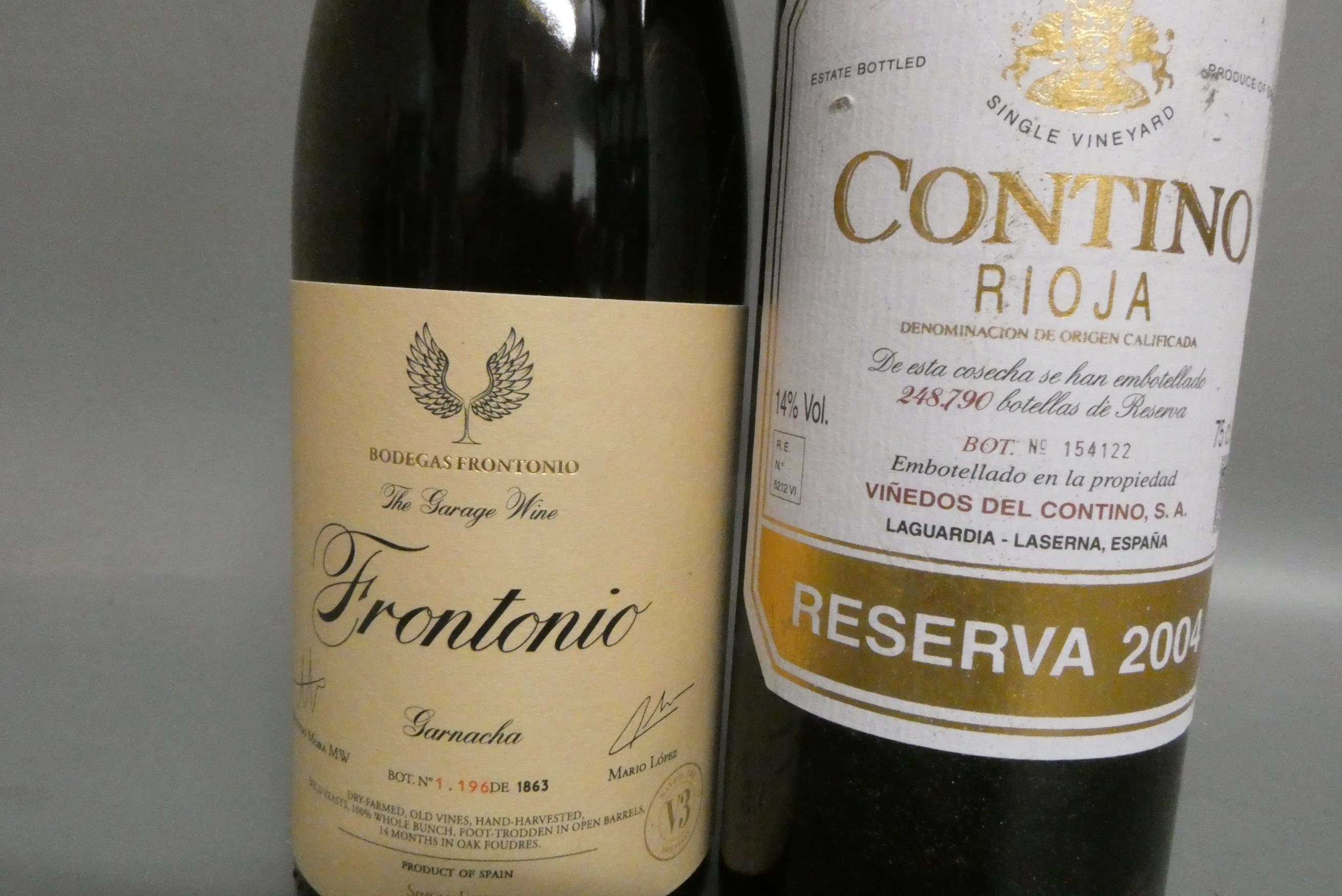 Two bottles of Spanish wine, comprising one 2004 Contino rioja, vinedos del contino, and a 2019 Image