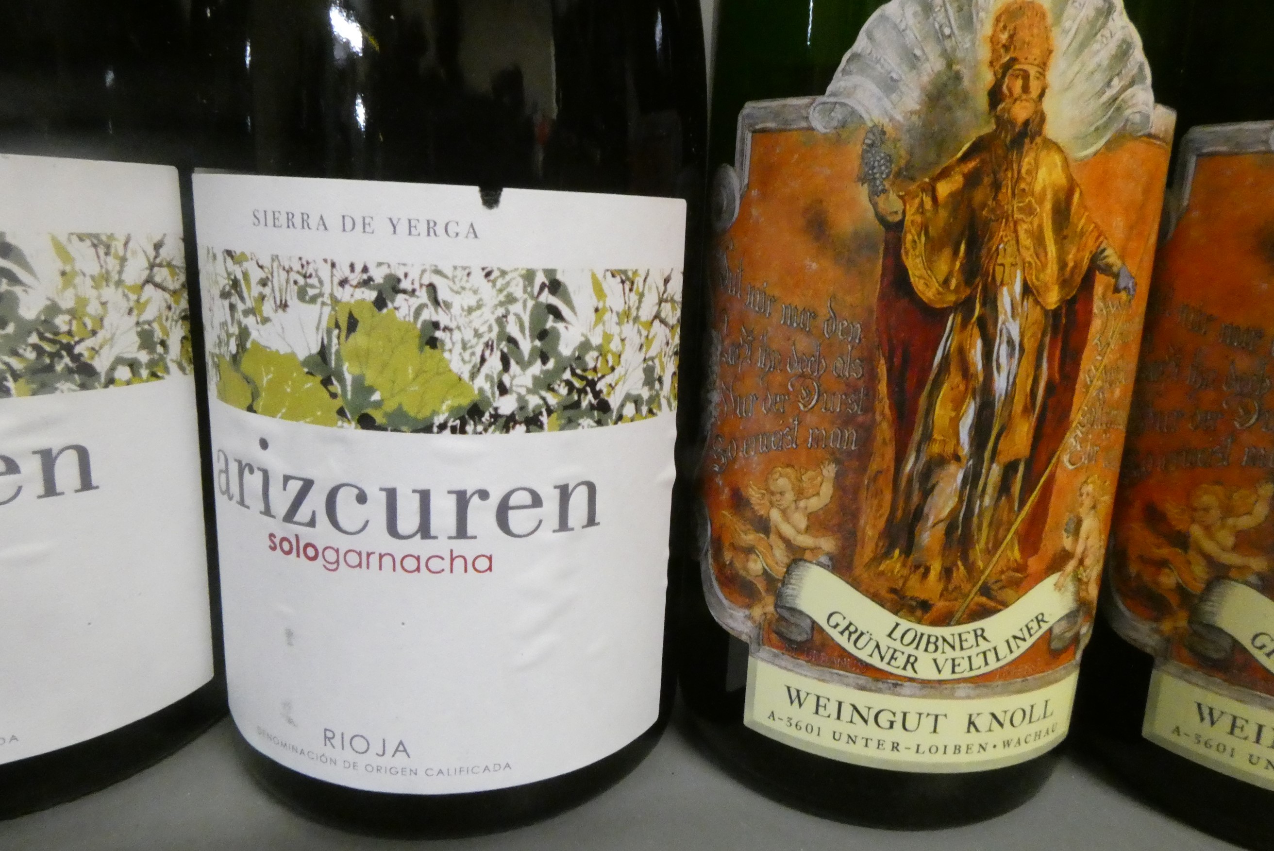 Seven bottles of European wine, comprising four Arizcuren, 2015, Sologarnacha rioja, and three Image