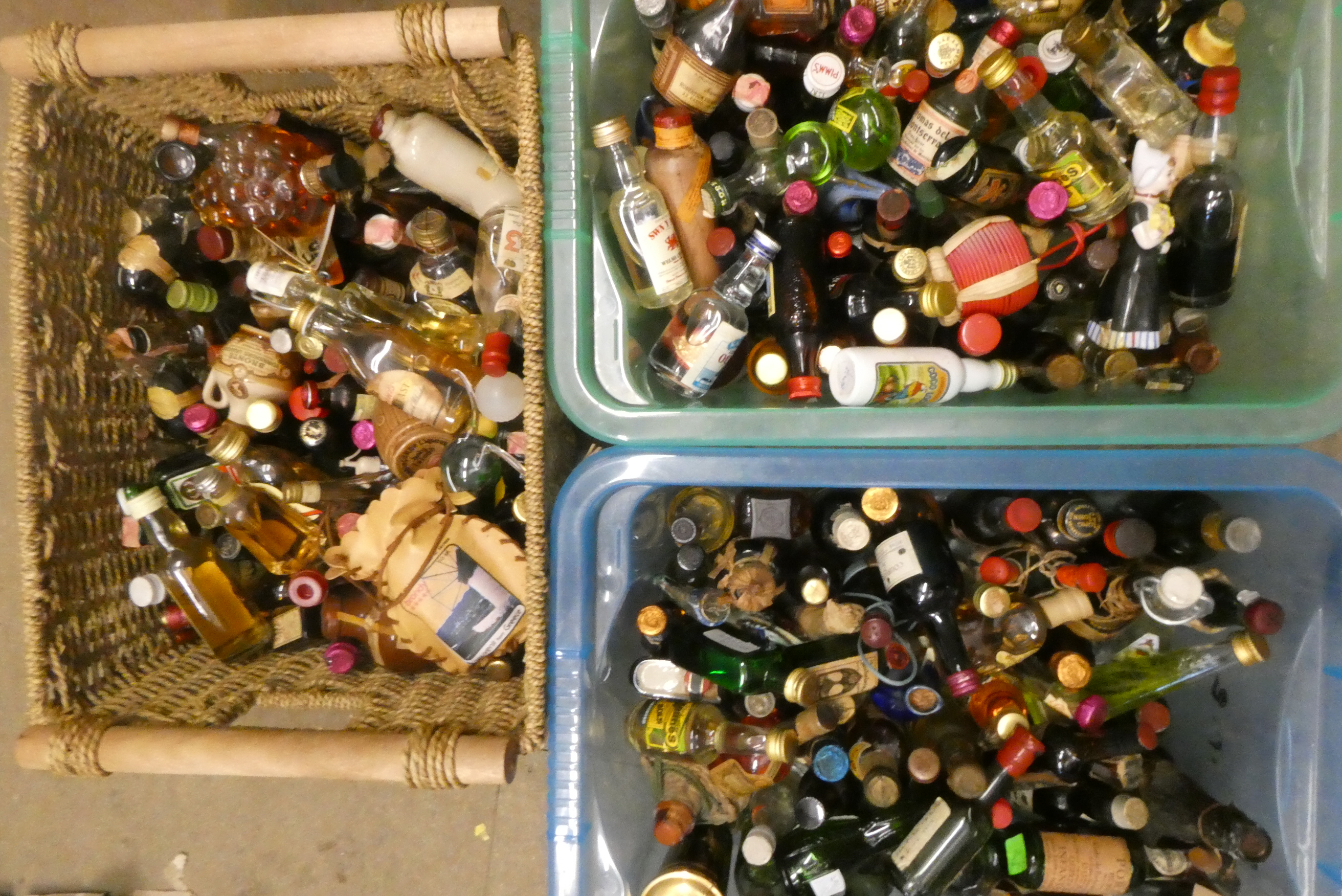 A large quantity of alcohol miniatures, including whisky, port, gin and liqueur (3) (Est. plus 24% Image