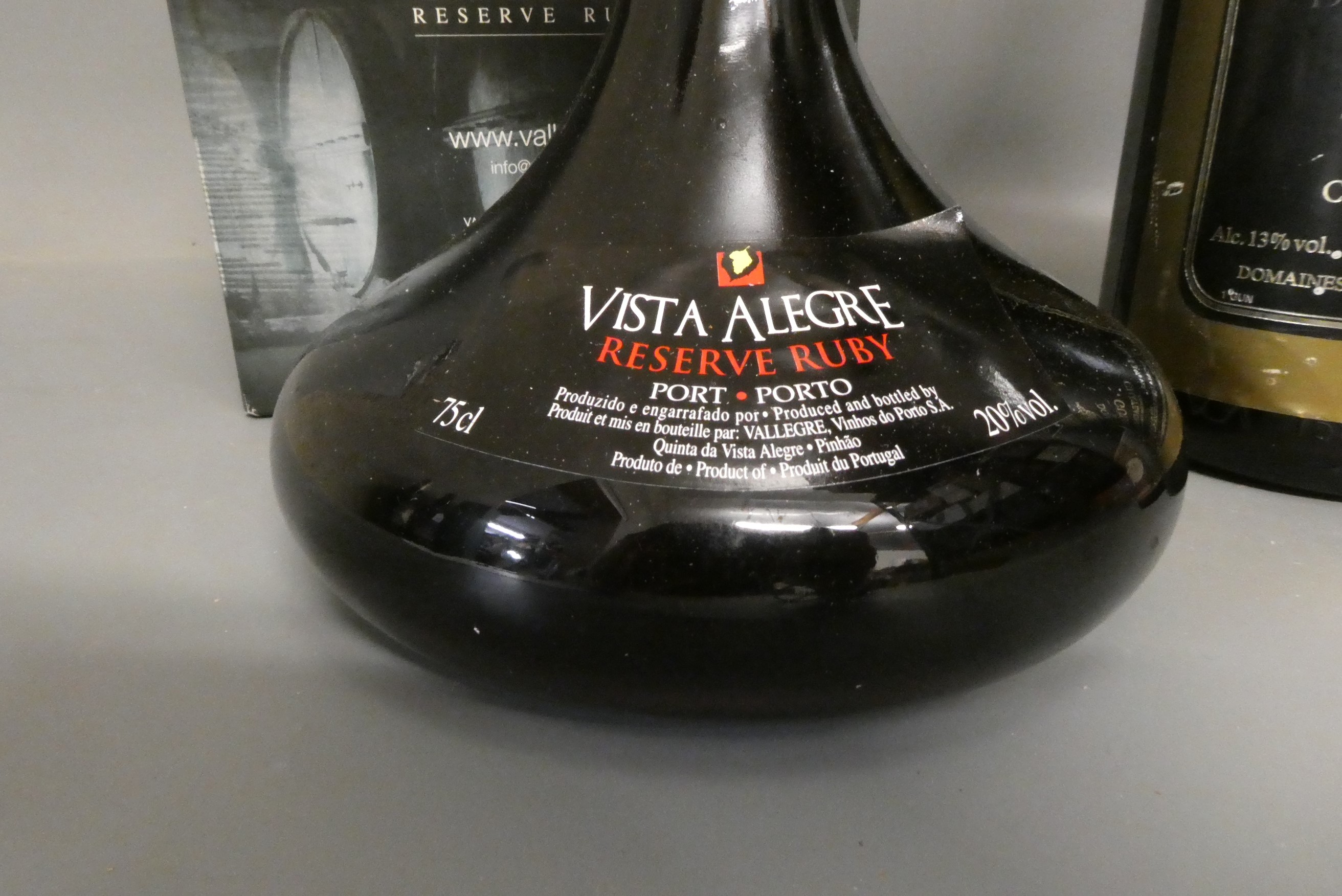 Three bottles comprising a magnum of Domaine de la Guerine,1990, Chateauneuf du Pape, a bottle Image