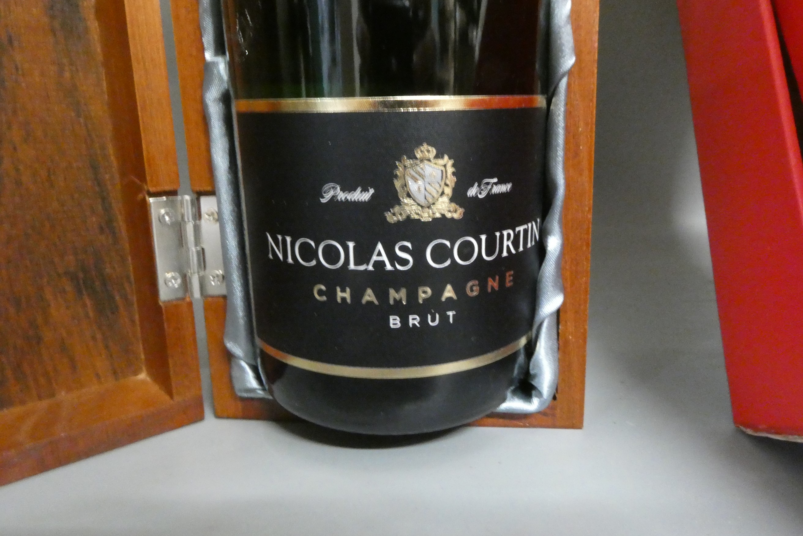 Two boxed bottles of champagne brut, comprising a Highgrove champagne and a Nicolas Courtin Image
