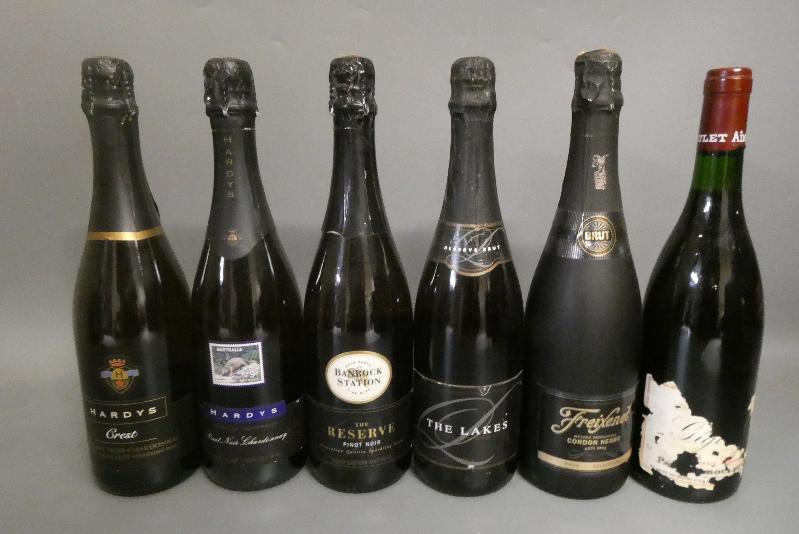 Five bottles of sparkling wine and brut Image