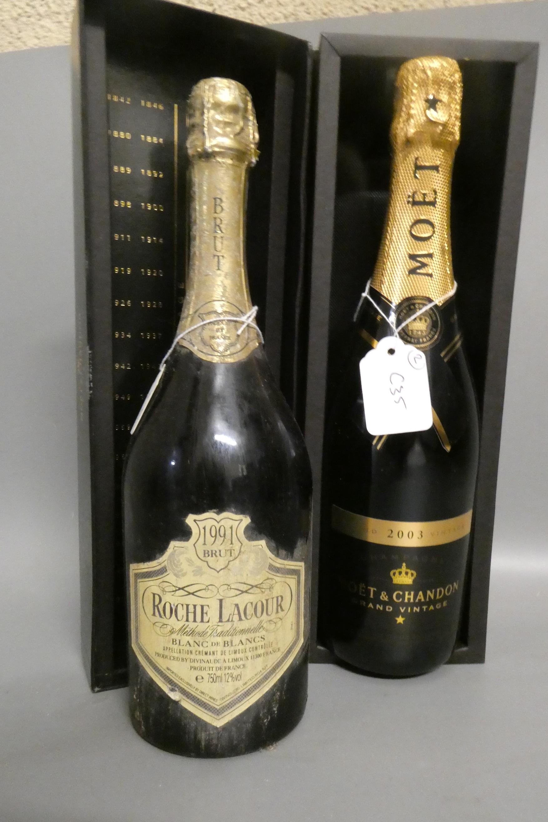One bottle Moet & Chandon 2003 vintage champagne, boxed, together with a Roche Lacour 1991 brut Image