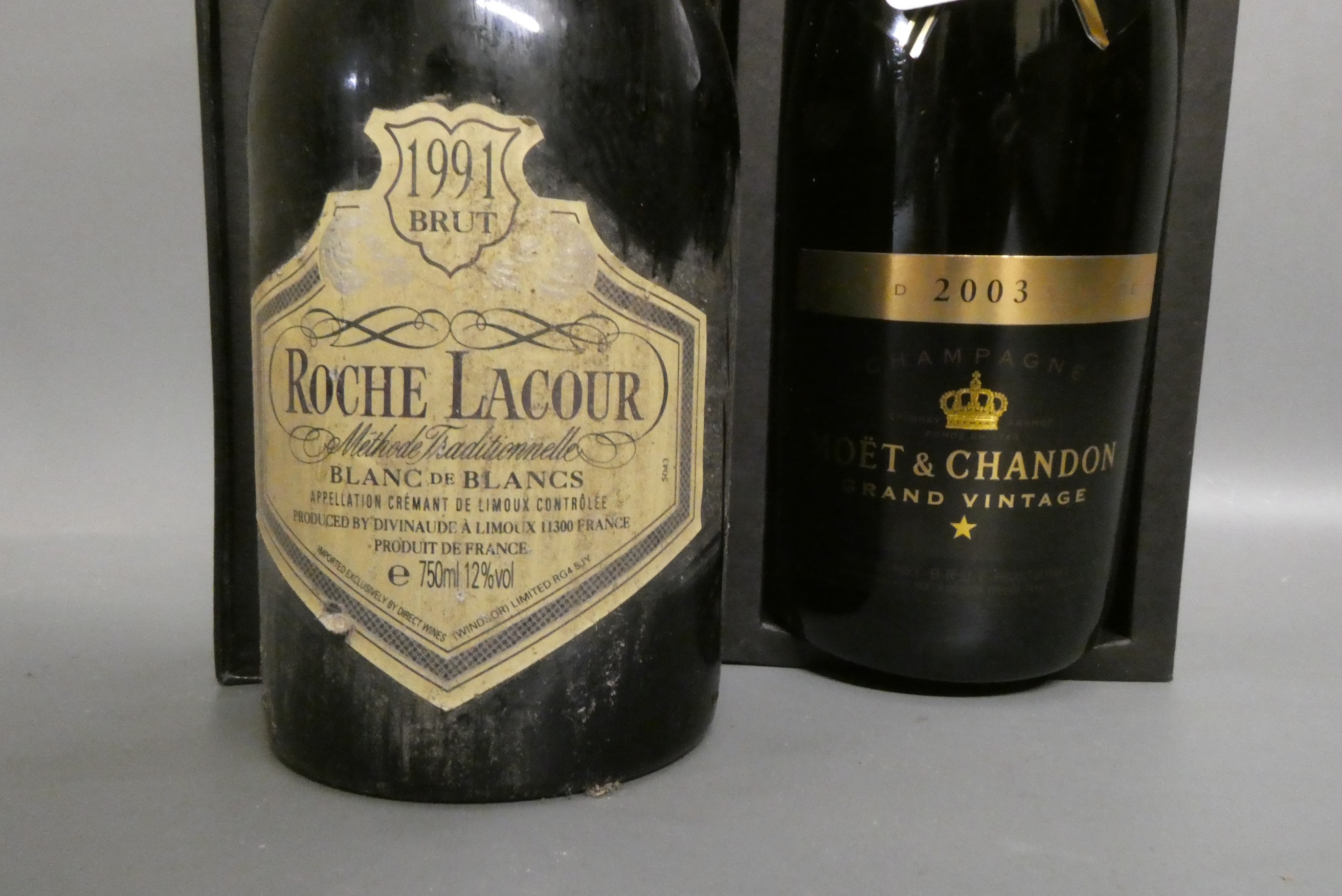 One bottle Moet & Chandon 2003 vintage champagne, boxed, together with a Roche Lacour 1991 brut Image