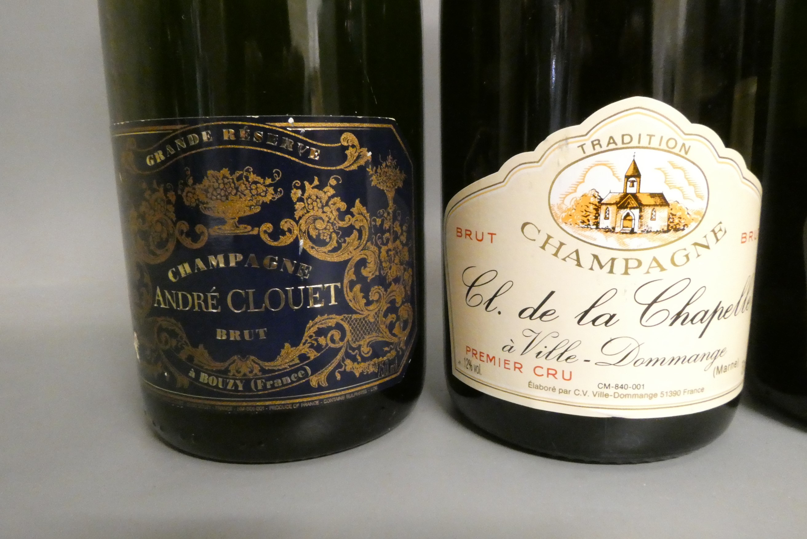 Five bottles of champagne, comprising two Etienne Dumont brut, one Andre Clouet brut, one Cl. de la Image