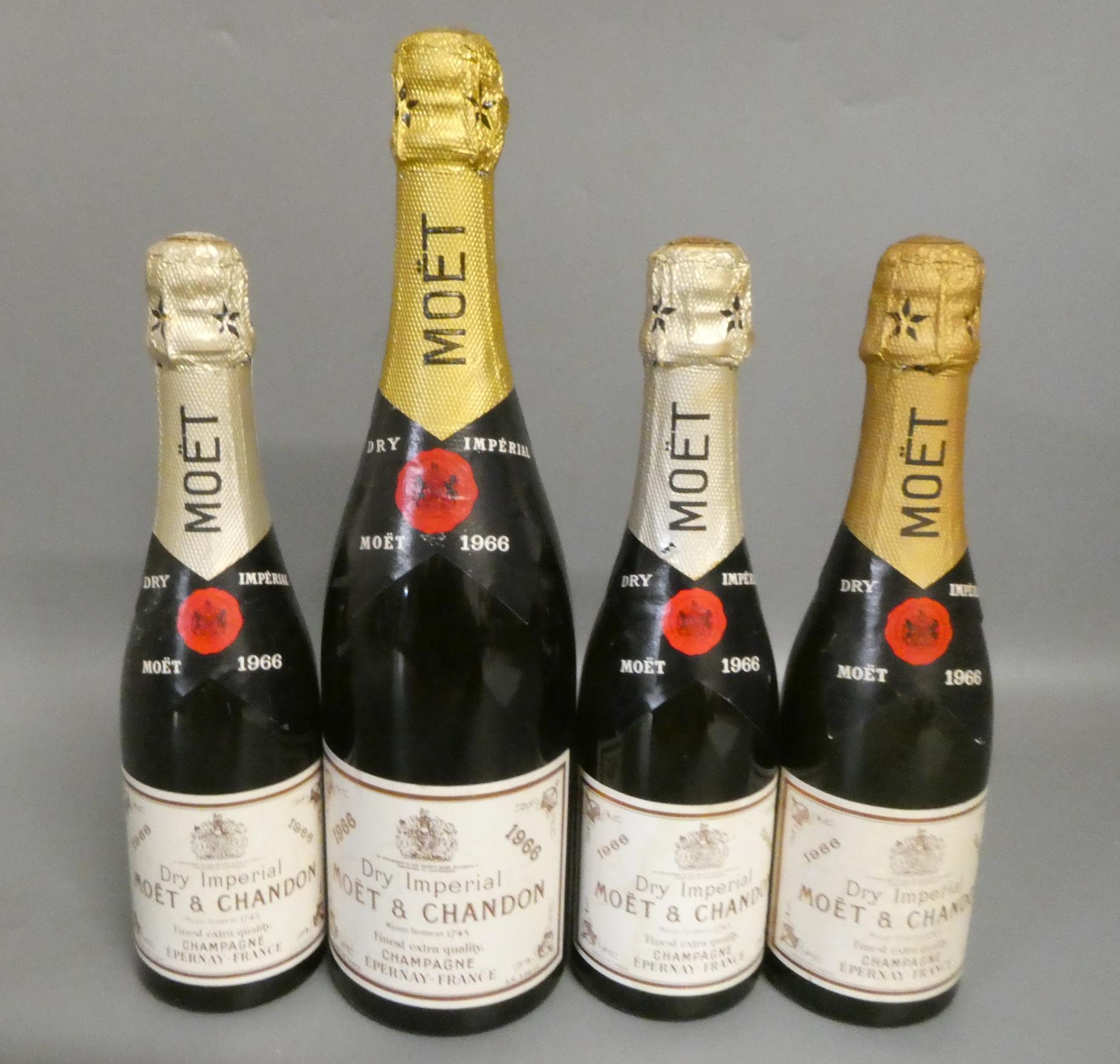 One full and three half bottles Moet & Chandon 1966 Dry Imperial champagne (Est. plus 24% premium Image