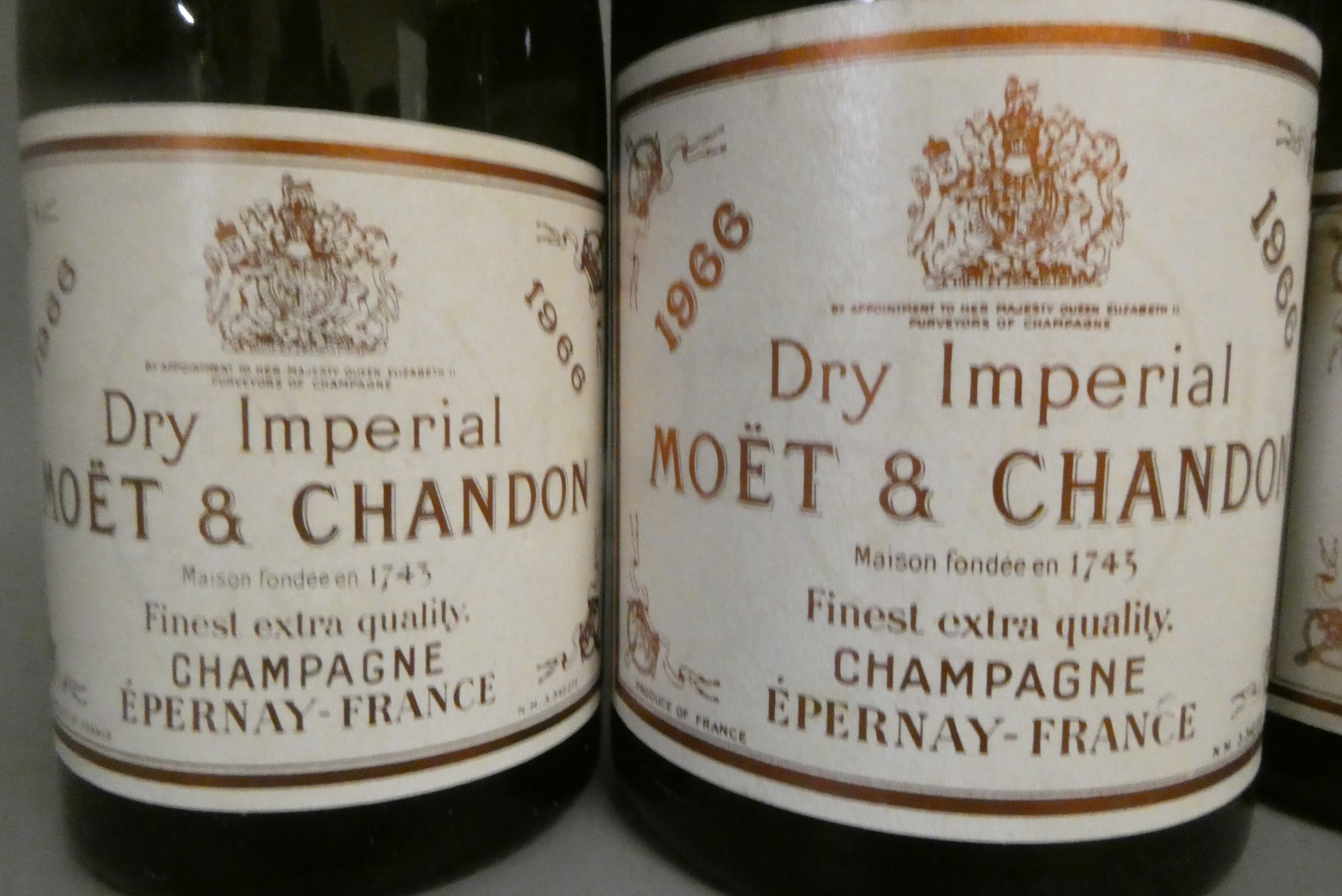 One full and three half bottles Moet & Chandon 1966 Dry Imperial champagne (Est. plus 24% premium Image