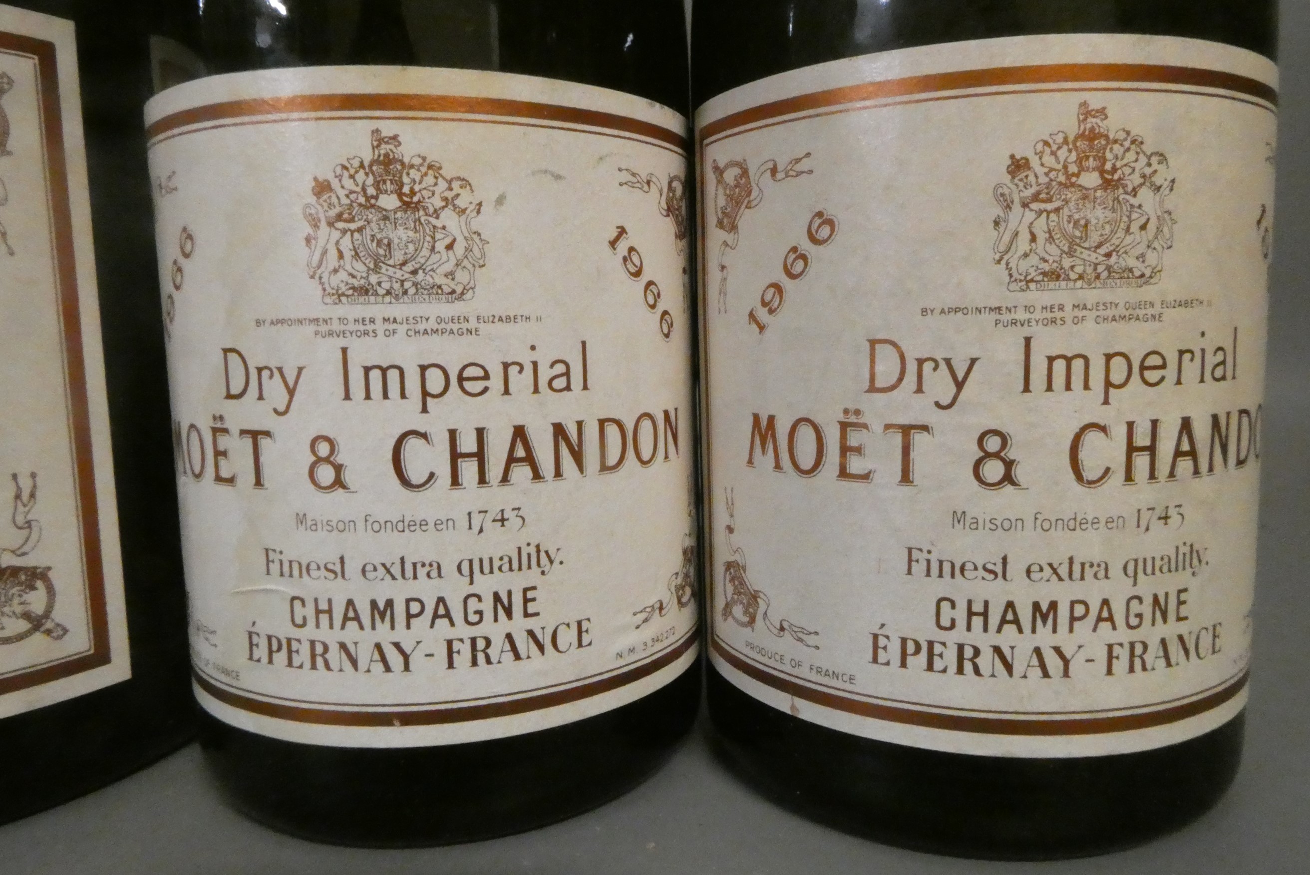 One full and three half bottles Moet & Chandon 1966 Dry Imperial champagne (Est. plus 24% premium Image