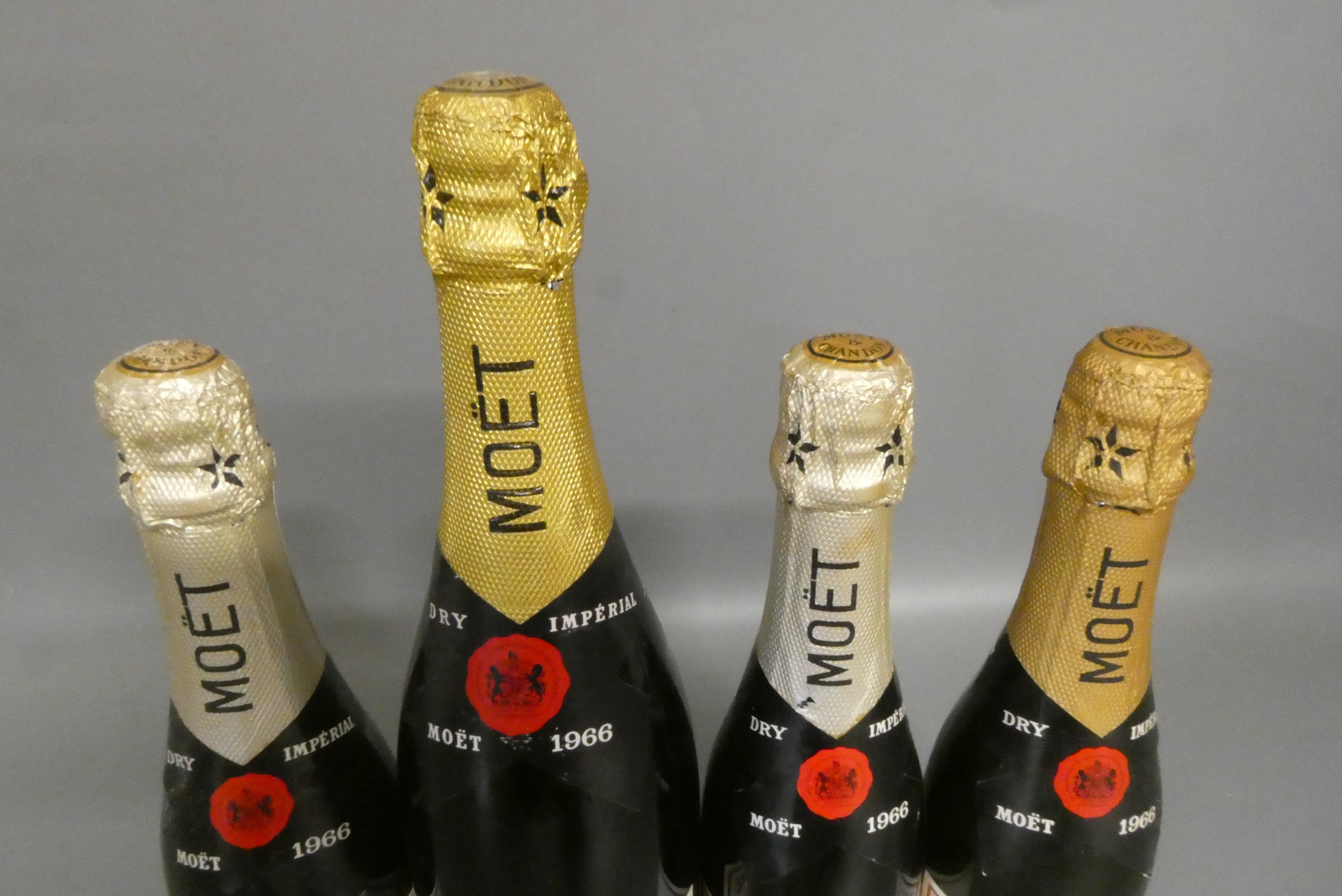 One full and three half bottles Moet & Chandon 1966 Dry Imperial champagne (Est. plus 24% premium Image