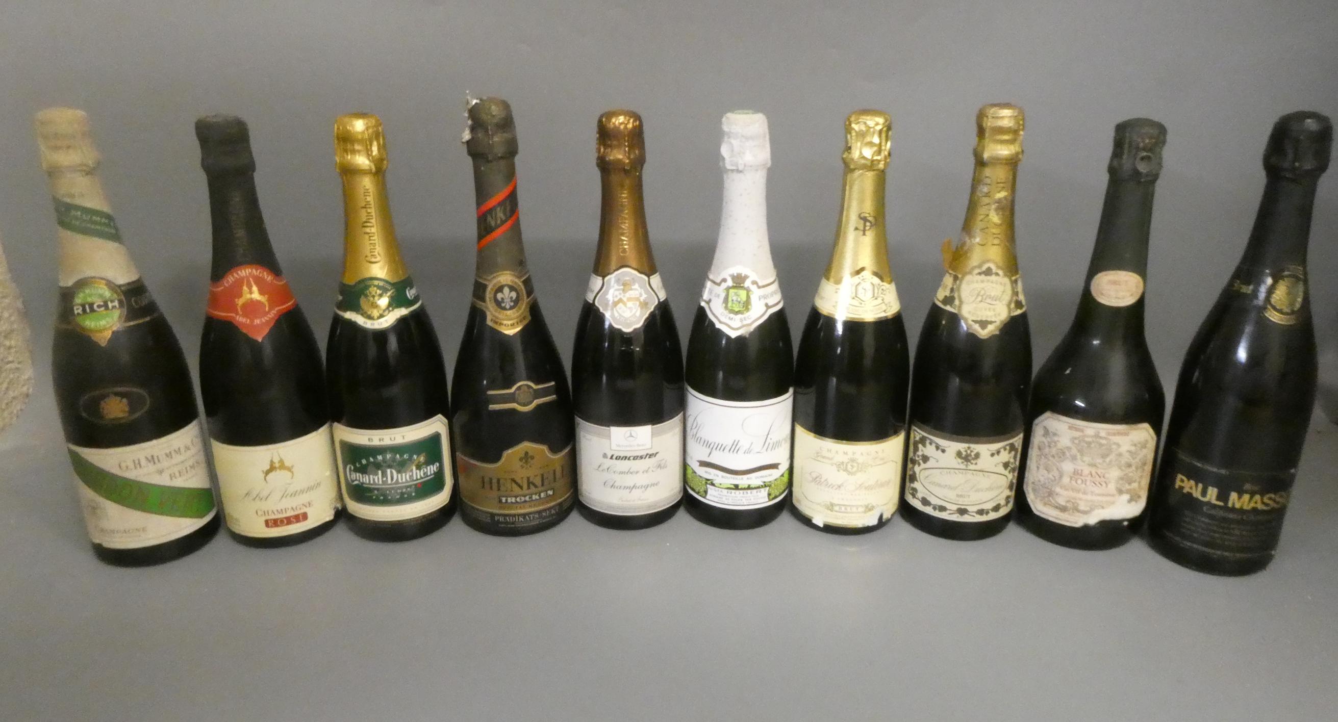 Ten bottles of sparkling wine Image