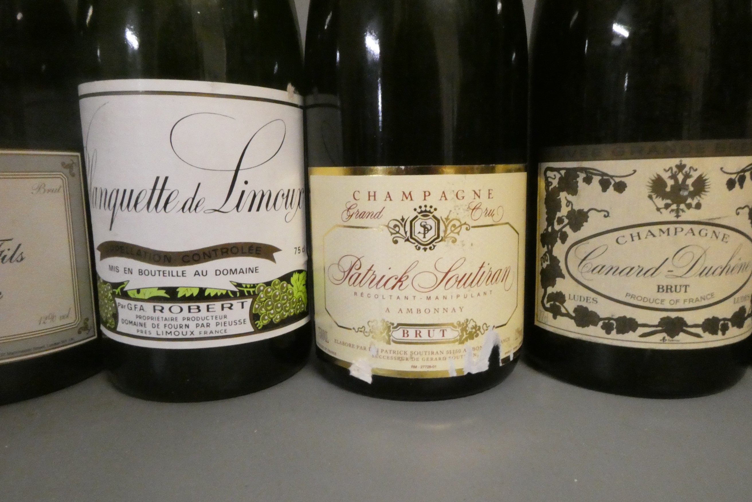 Ten bottles of sparkling wine Image